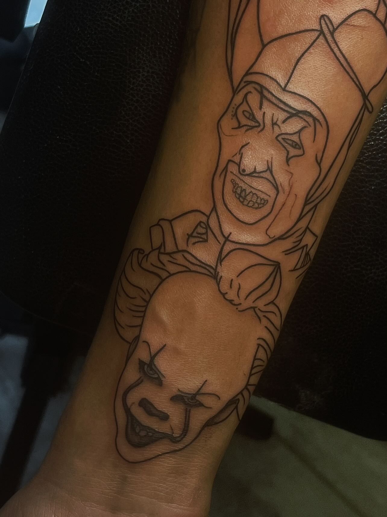 Clowns black and grey tattoo on the forearm by π’ππ΅π΅π΄ π©°π