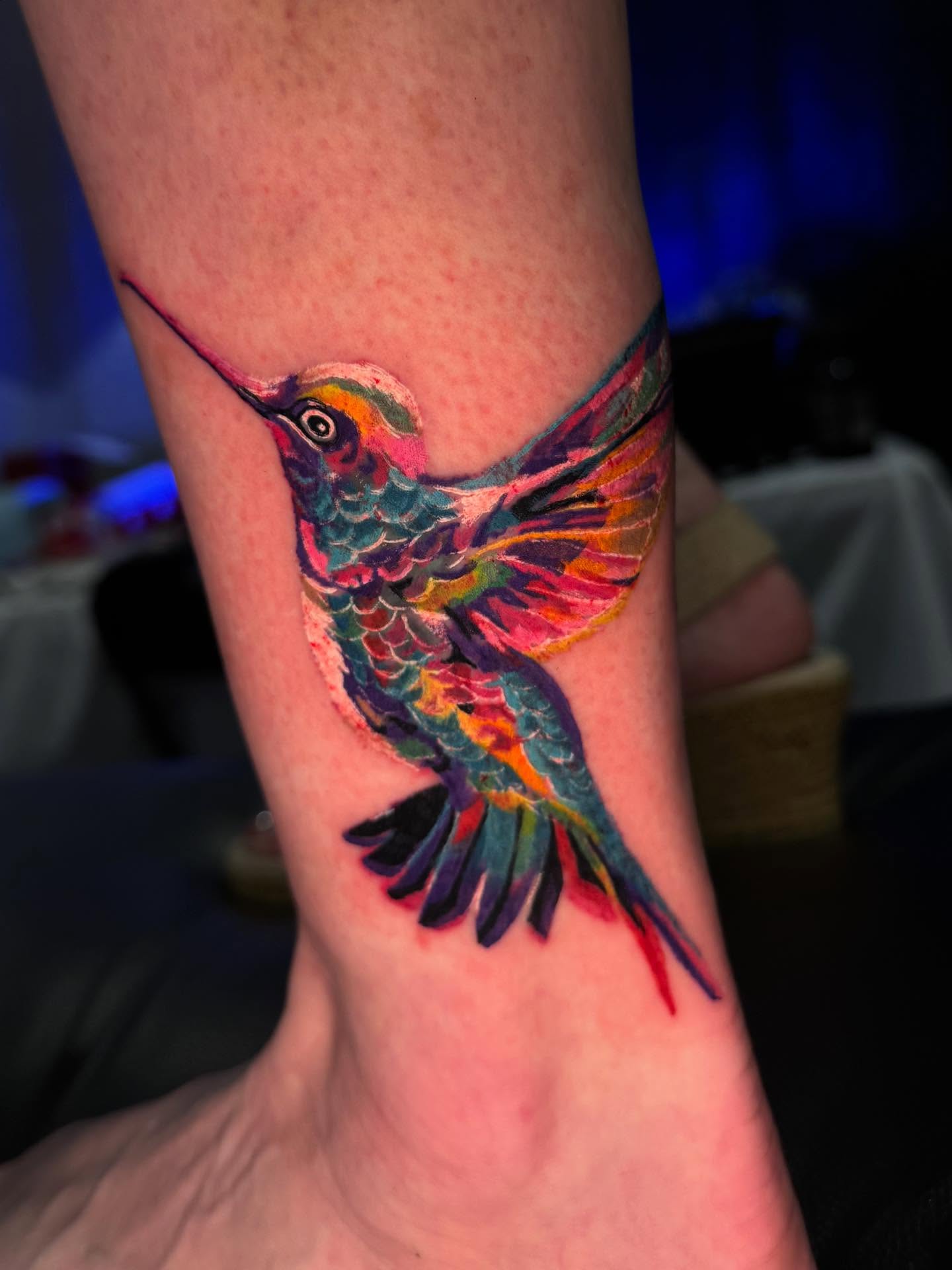 Hummingbird watercolor tattoo on the forearm by Therapy ink