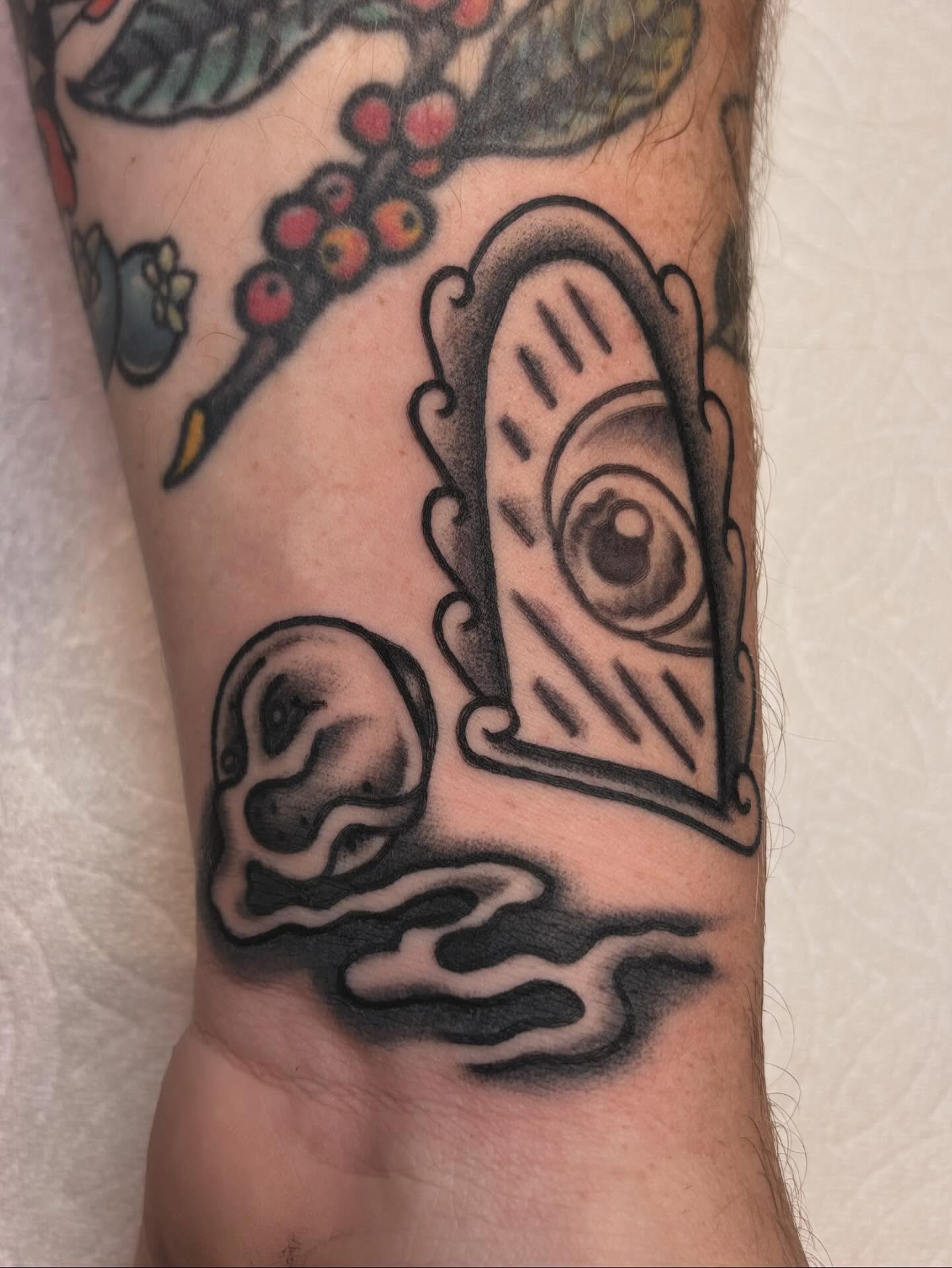 Eye and cloud American traditional tattoo on the forearm by ๐๐๐ฏ๐ข๐ซ