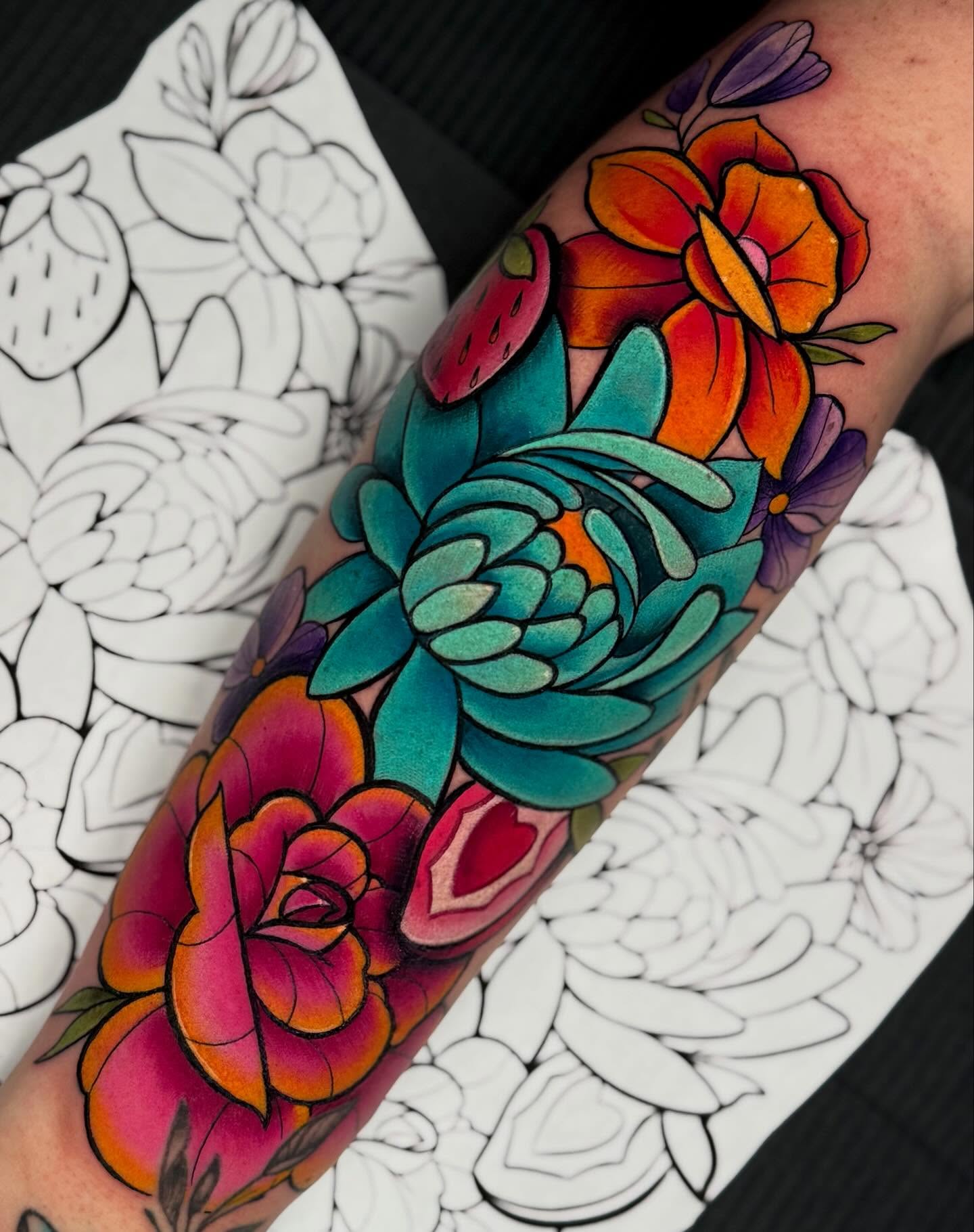 Floral bouquet American traditional tattoo on the forearm by Brianna Dickson