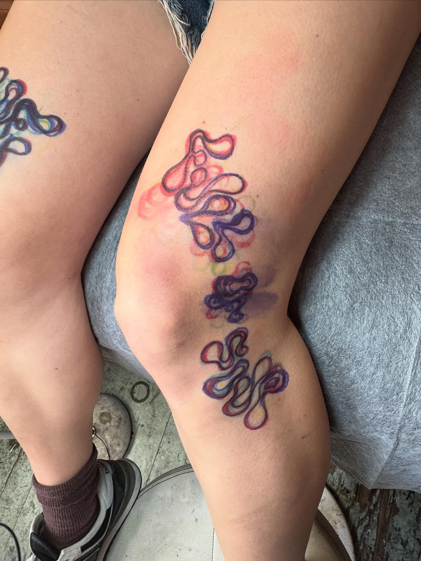Abstract shapes watercolor tattoo on the forearm by @mr.smiley___