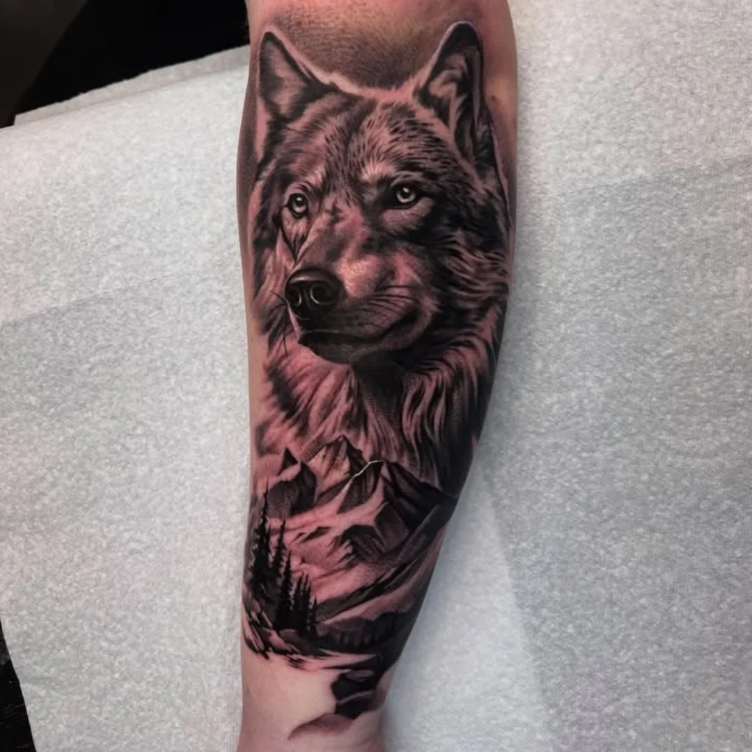 Wolf realism tattoo on the forearm by ink.alchemist