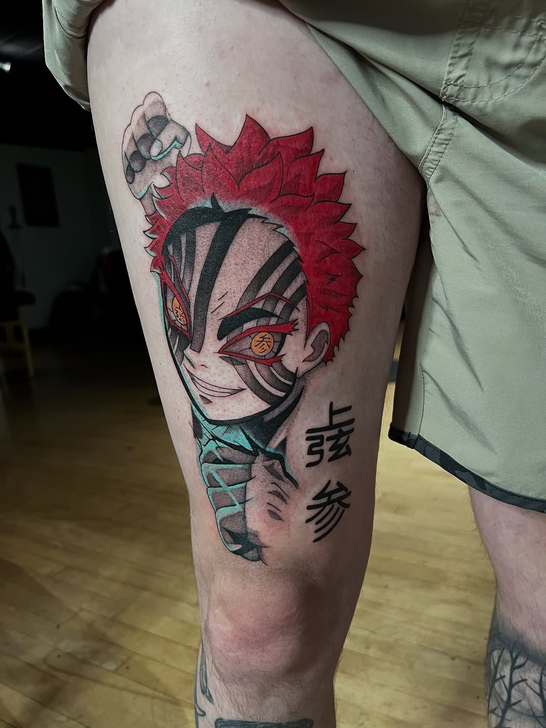 Anime tattoo on the thigh by Sam