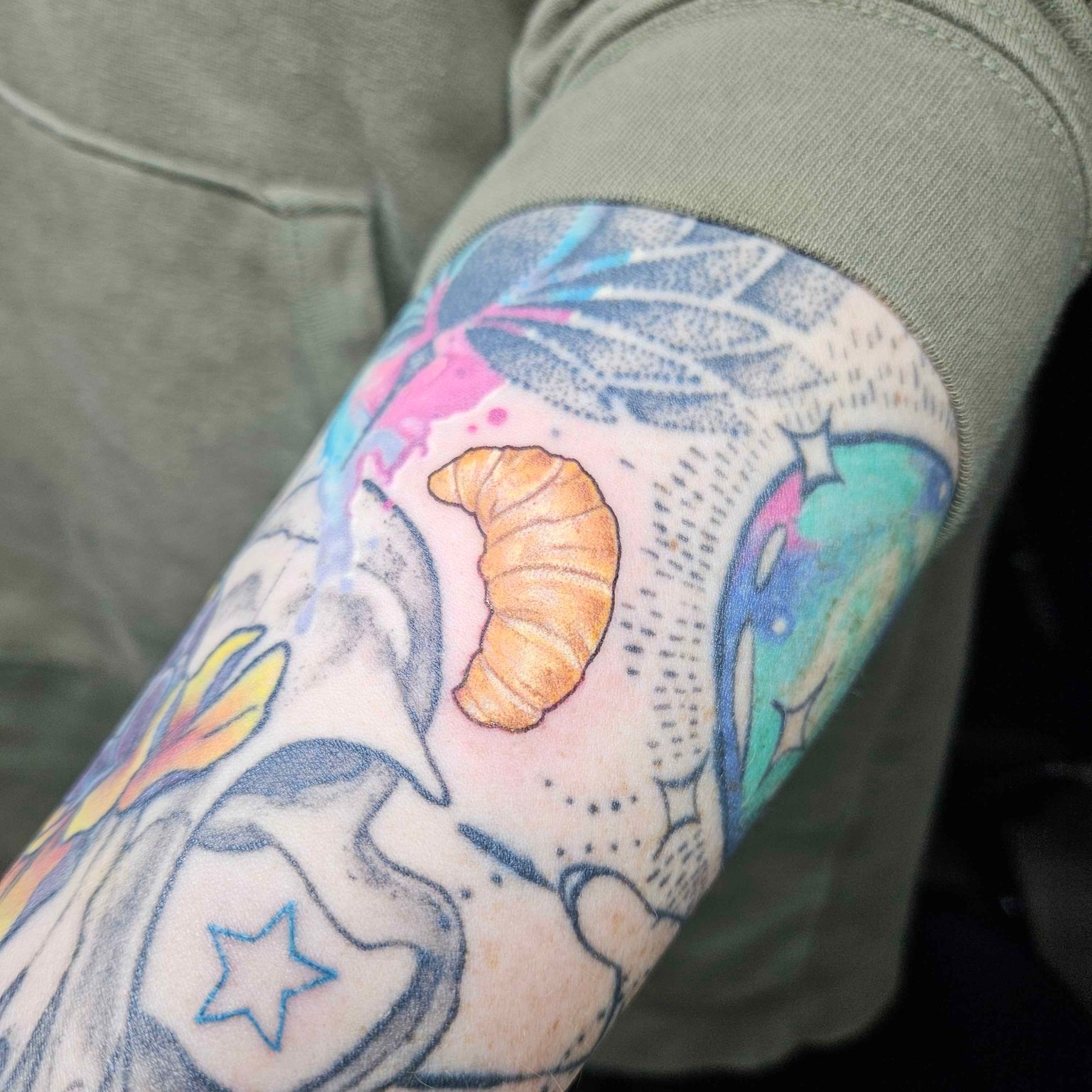 Croissant dotwork tattoo on the forearm by Iram Withencroft