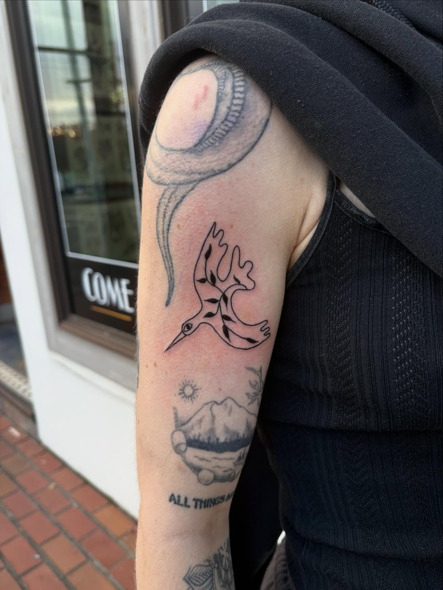Bird and tornado black and grey tattoo on the forearm by ellie