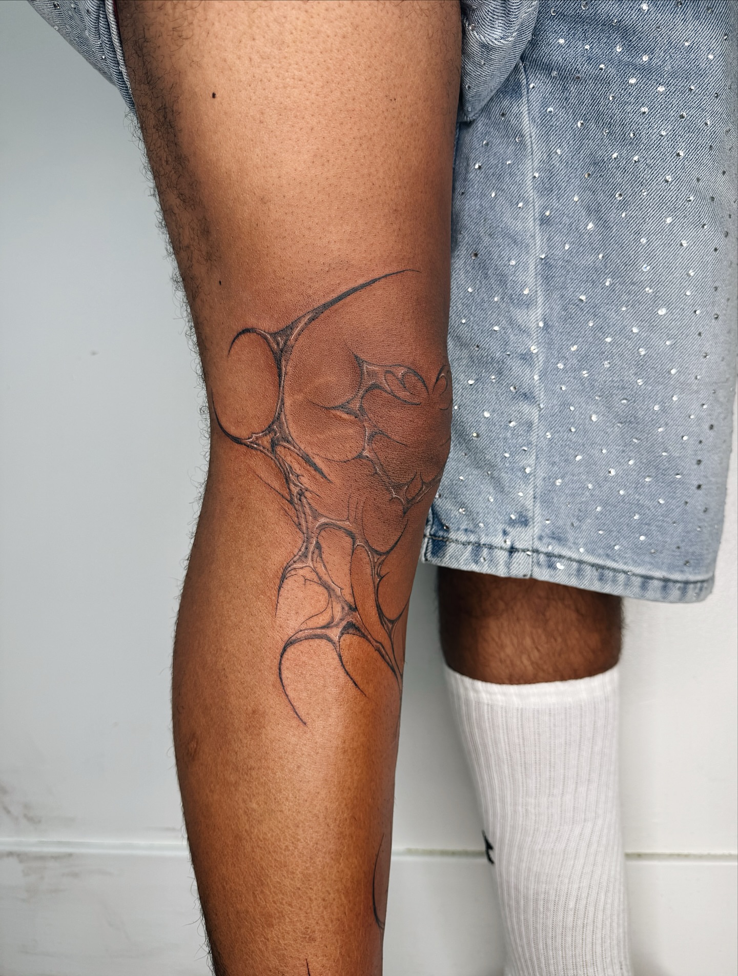 Abstract design geometric tattoo on the calf by viktoria raquel