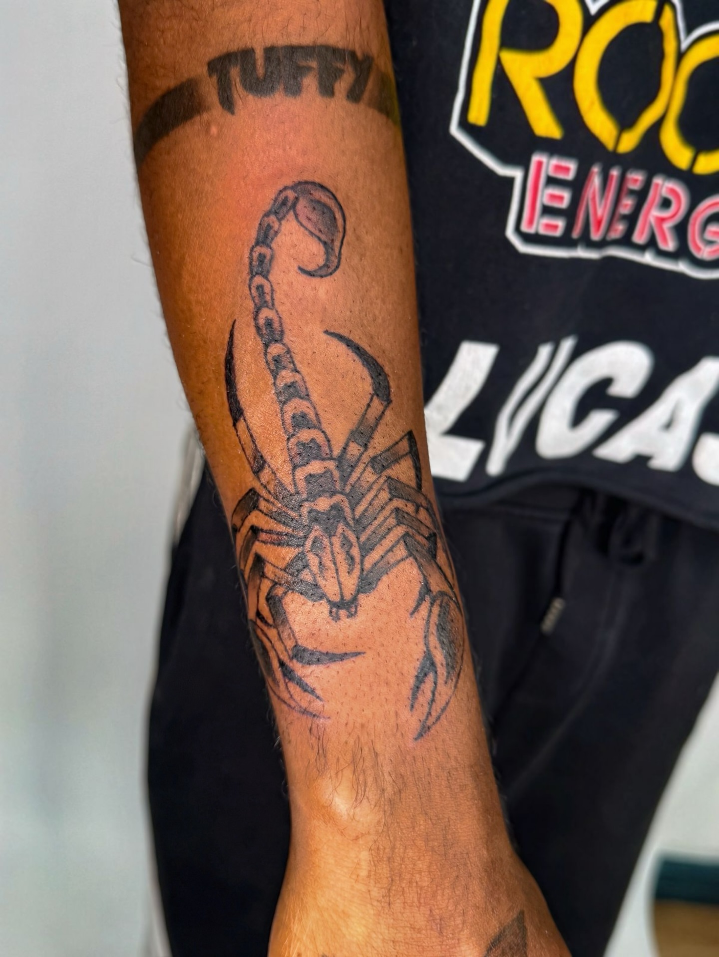 Scorpion black and grey tattoo on the forearm by Tiffany