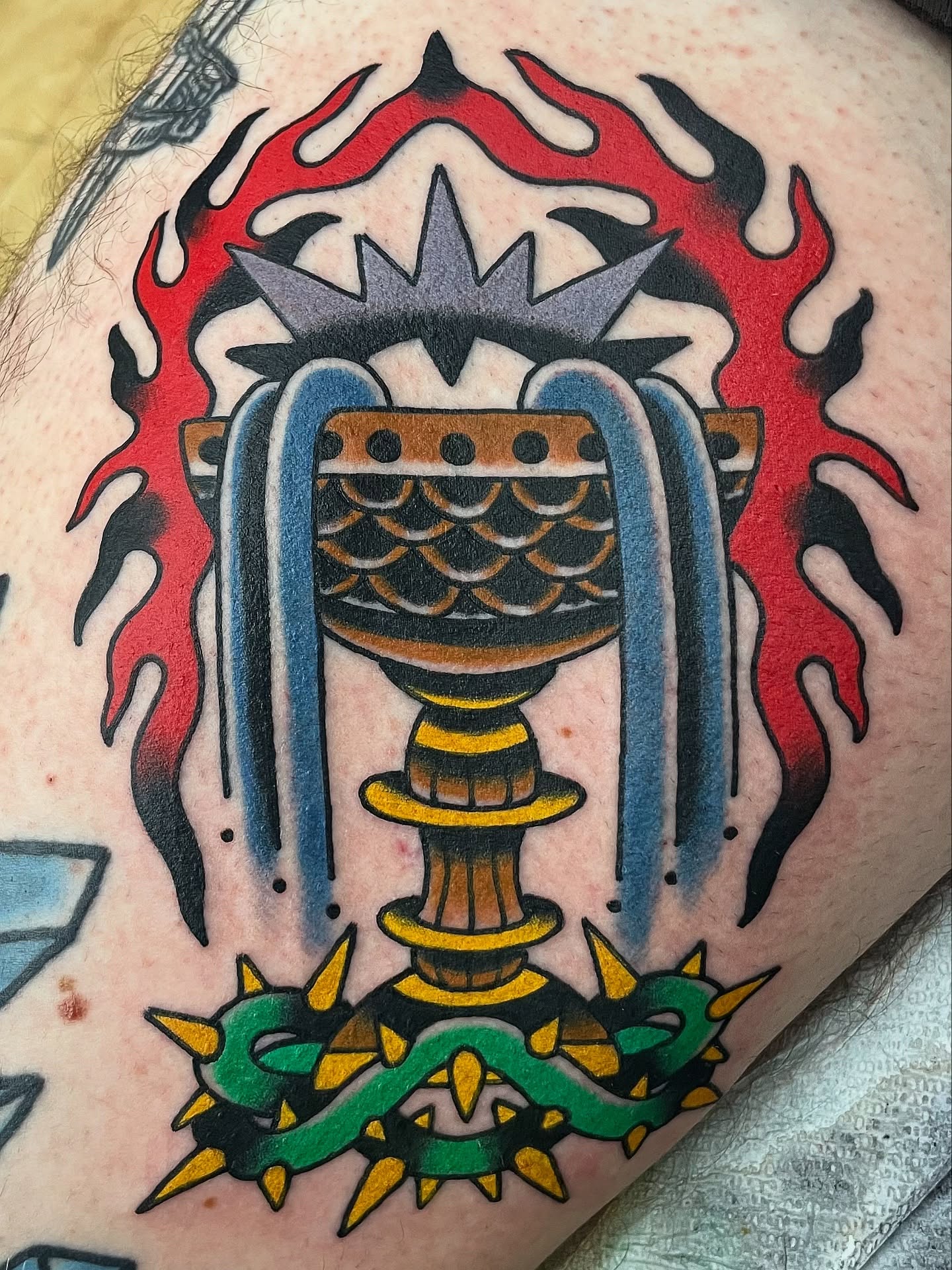 Chalice and dragon American traditional tattoo on the thigh by Frank Mostek