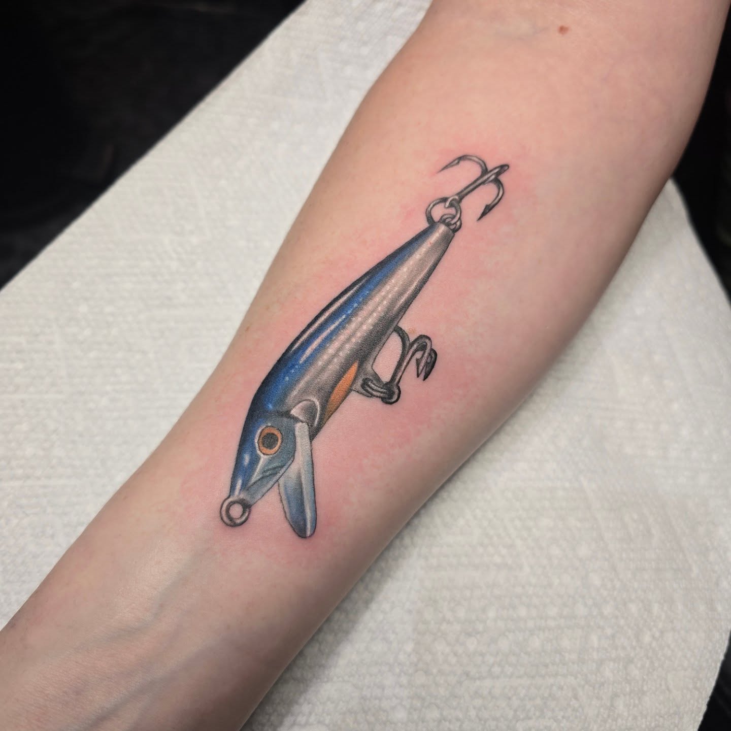 Lure realism tattoo on the forearm by Gabrielle Nicole Soucie