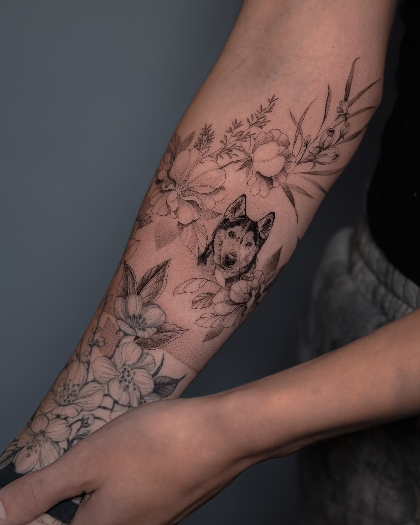 Dog and floral arrangement realism tattoo on the forearm by ♡ 𝕍𝕚𝕔𝕥𝕠𝕣𝕚𝕒 ℍ𝕠𝕝𝕞𝕖𝕤 ♡, Avon, Ohio