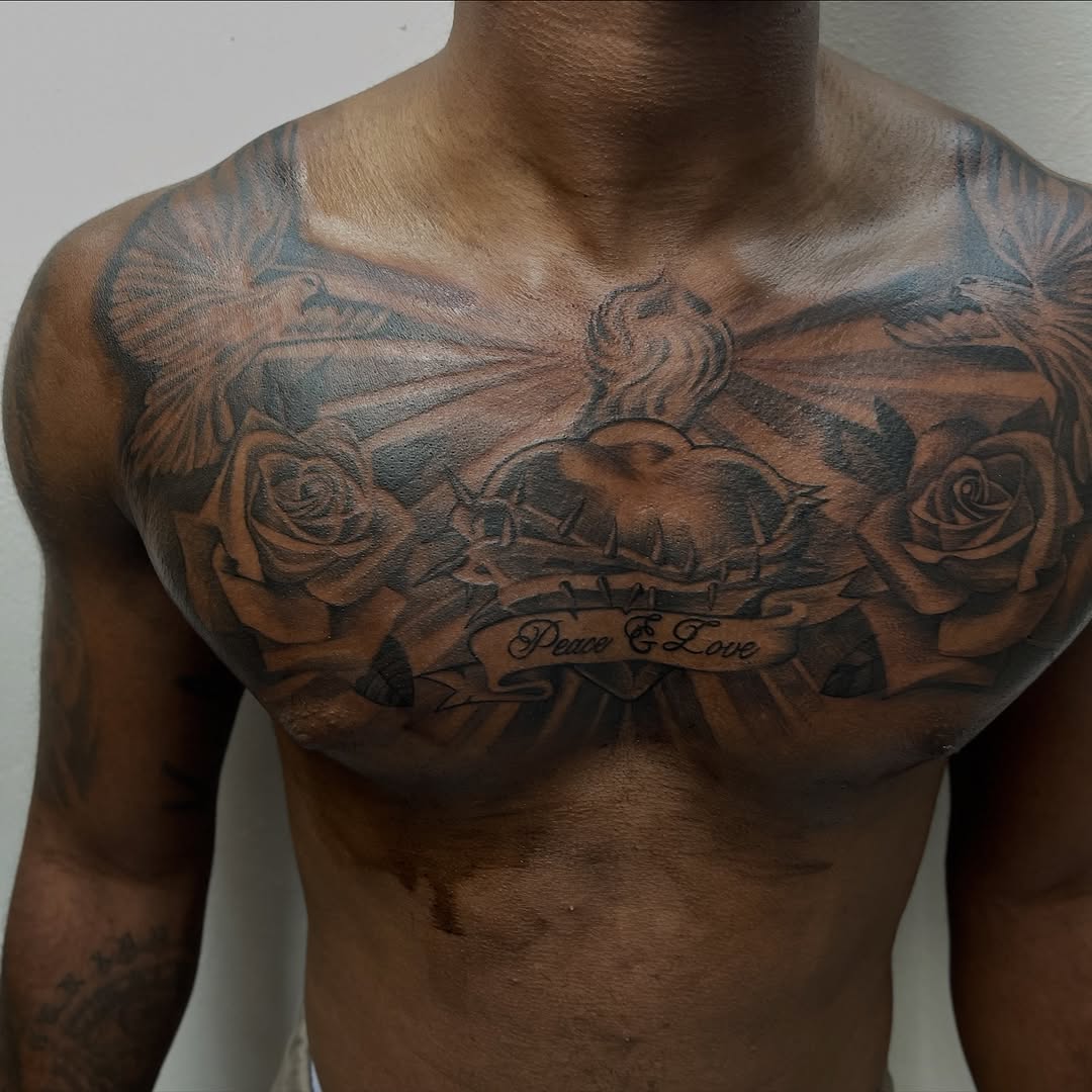 Sacred Heart with doves and roses realism tattoo on the chest by Jayme