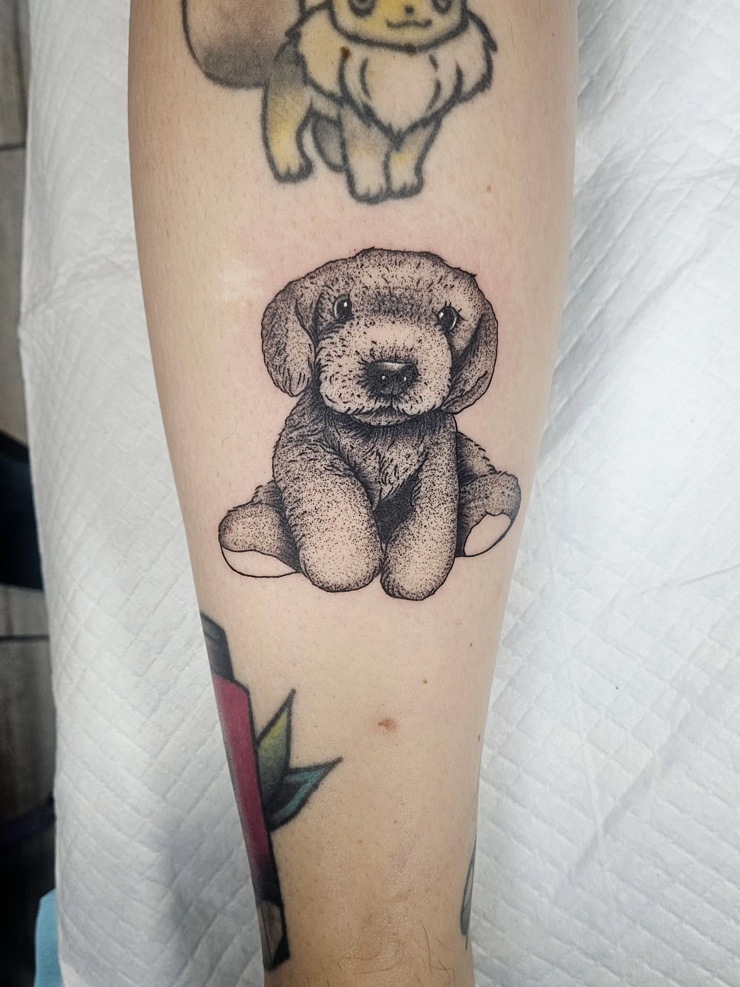 Teddy bear dotwork tattoo on the forearm by Kelsey Moore, Richmond, Virginia