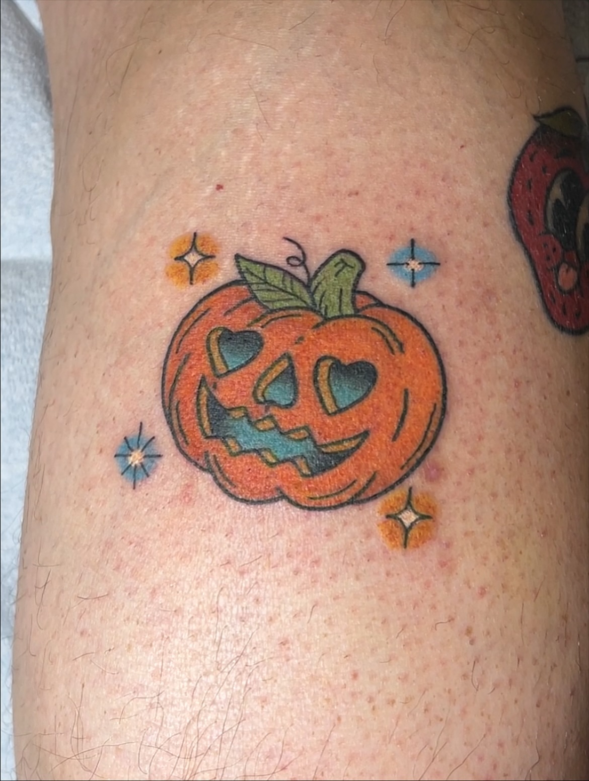 Jack-o'-lantern American traditional tattoo on the thigh by Mickey