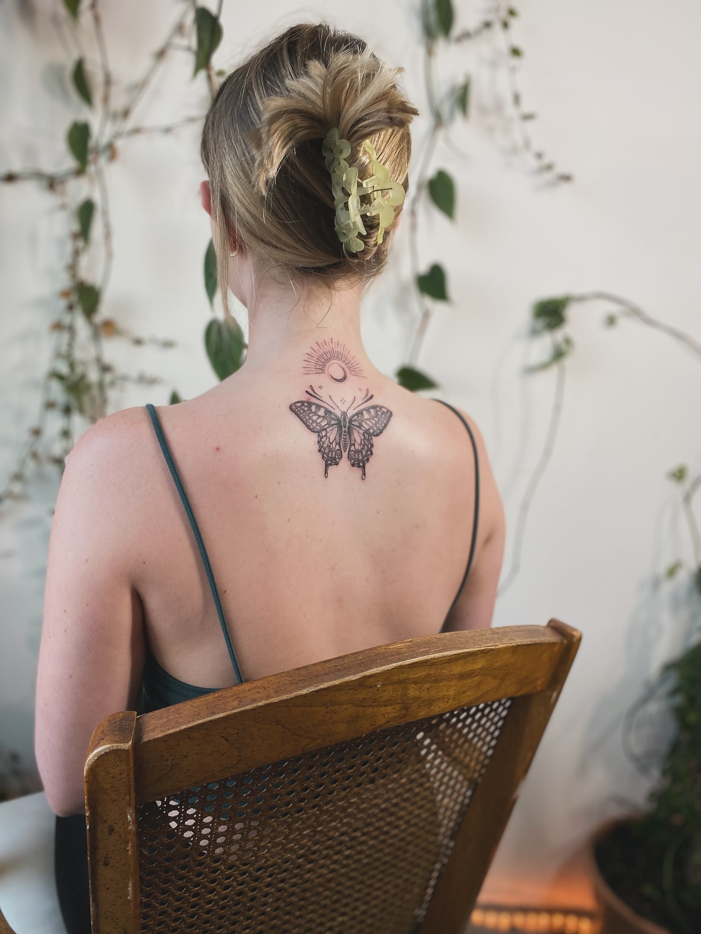 Butterfly and celestial symbols black and grey tattoo on the back by Santiago Don, Portland, Oregon