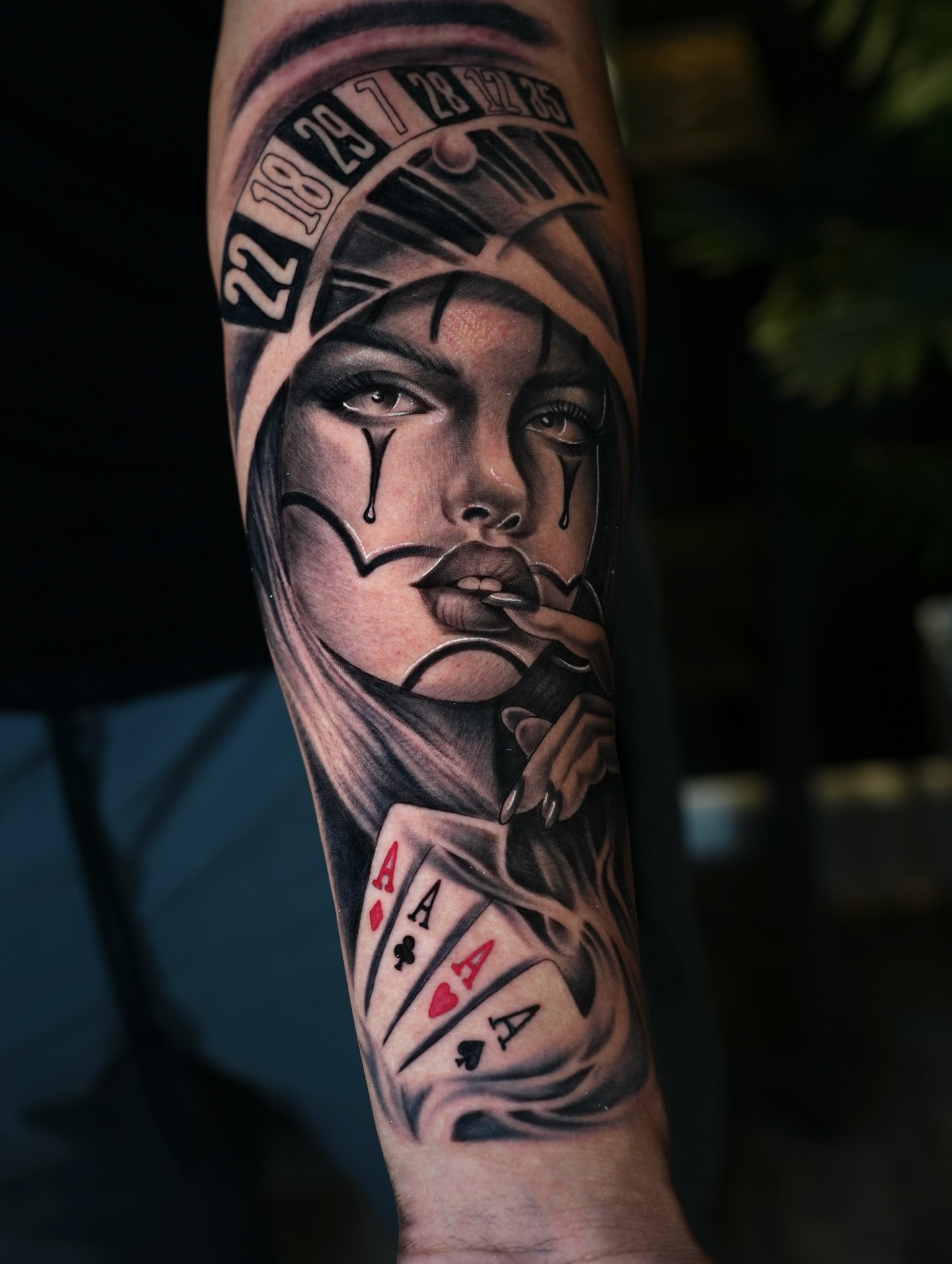 Woman with playing cards realism tattoo on the forearm by BillydaKid