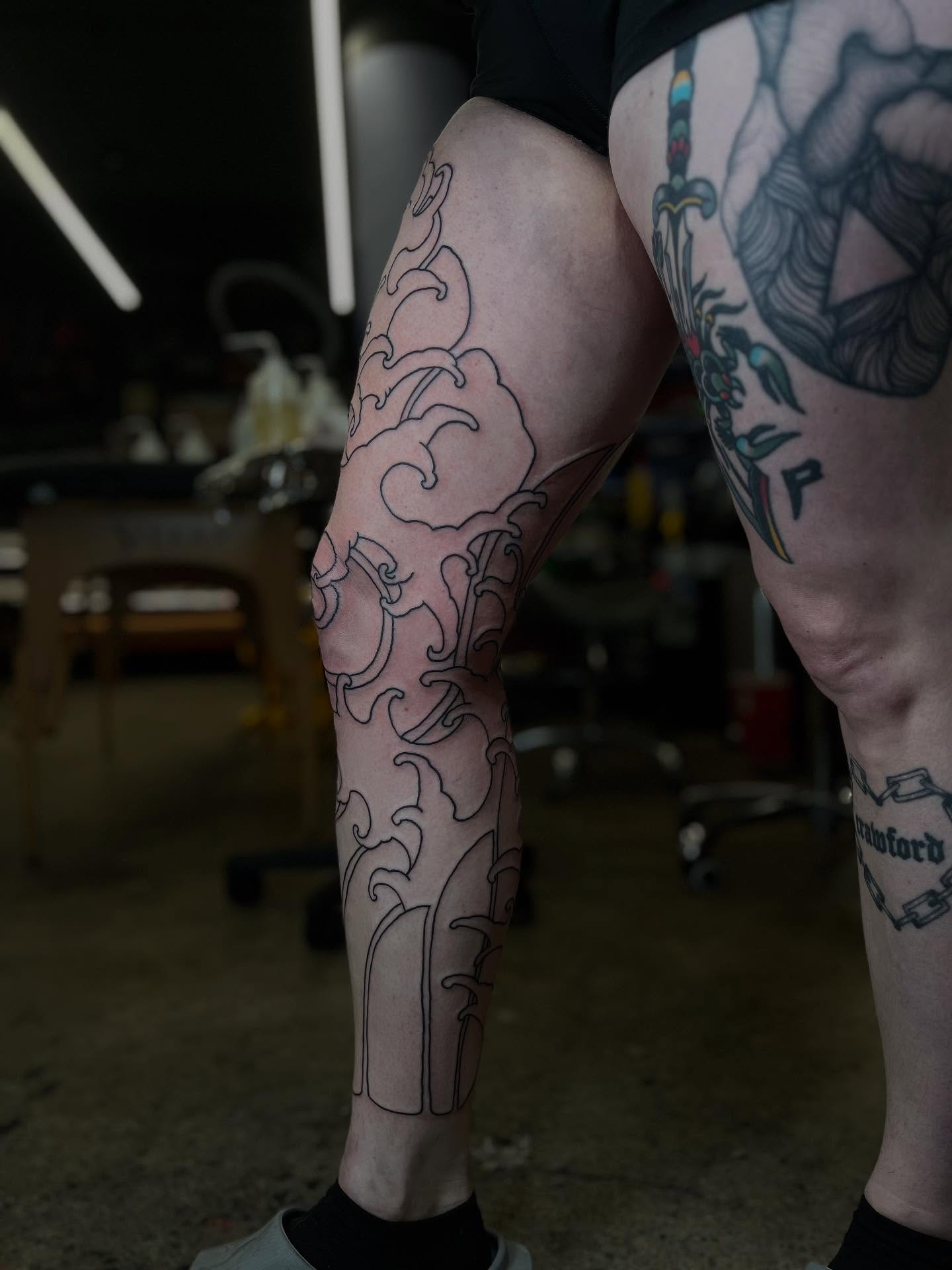 Wave pattern black and grey tattoo on the calf by Kaichi Fujita, Eugene, Oregon
