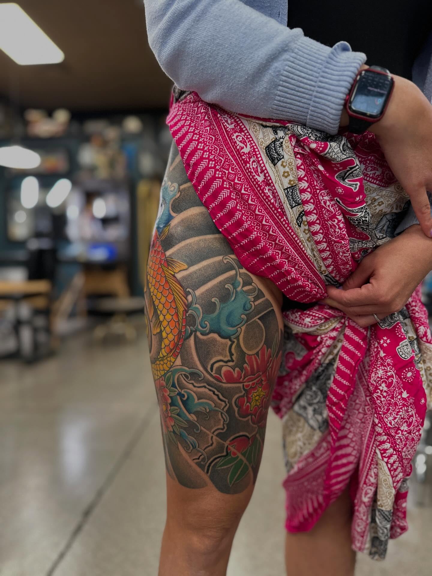 Koi fish and waves japanese irezumi tattoo on the thigh by Shawn Feng
