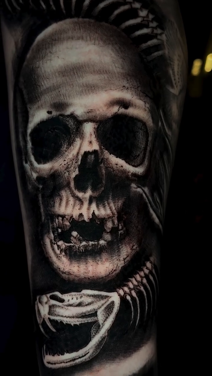 Skull with snake realism tattoo by Henry Fuentes