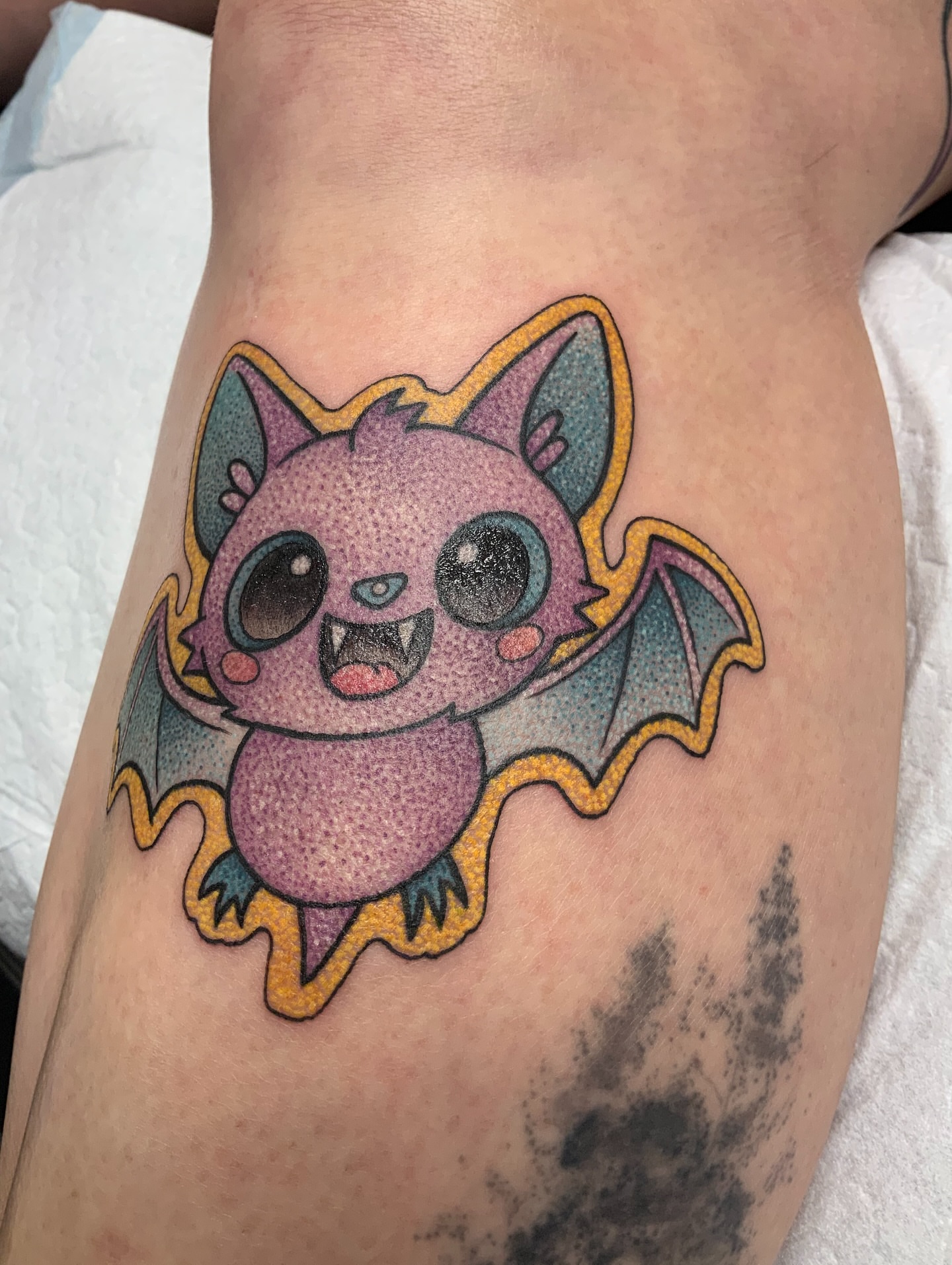 Bat dotwork tattoo on the thigh by QUEEN TATTOO Stephanie Larson