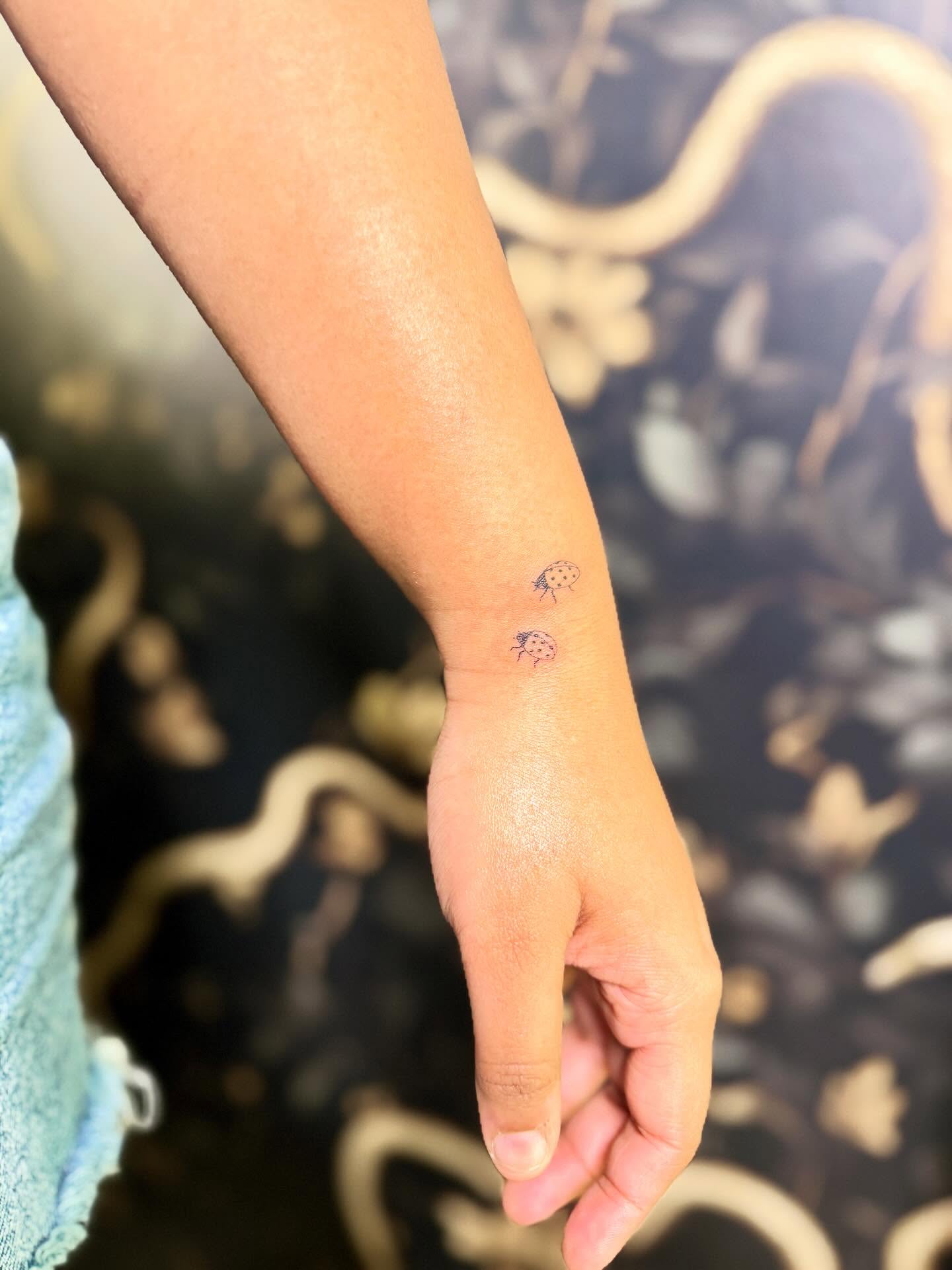 Ladybug dotwork tattoo on the forearm by Fineline Tattoos π€ Hailey L.