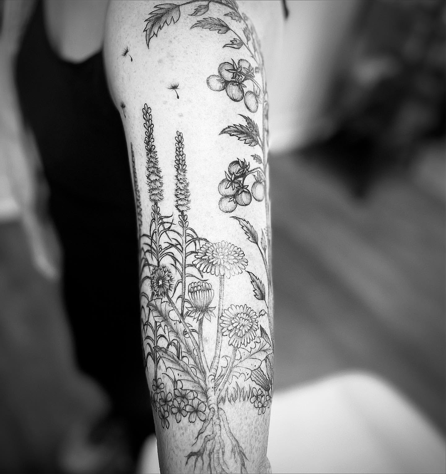 Botanical illustrations realism tattoo on the forearm by Rikki