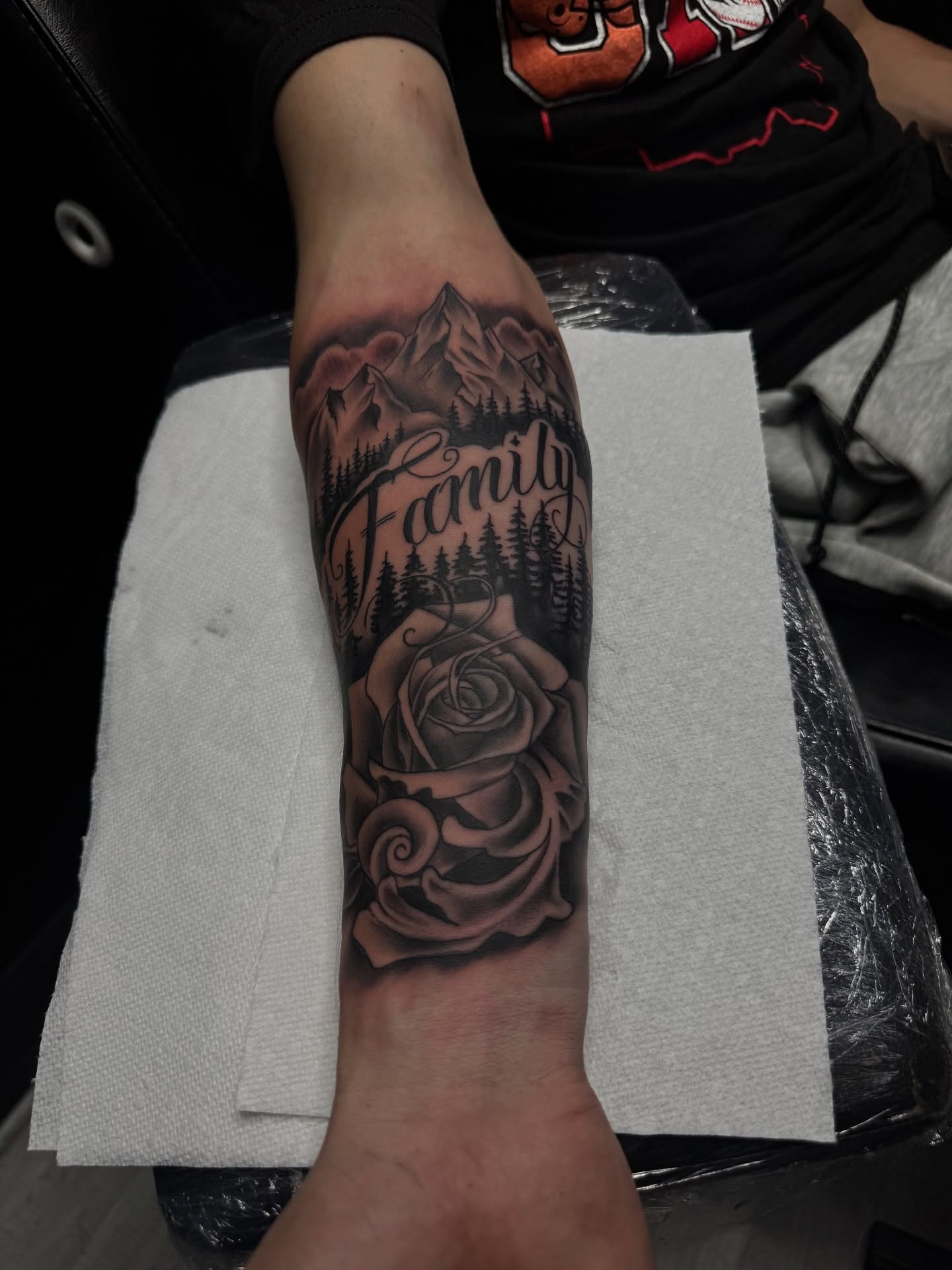 Family realism tattoo on the forearm by Zeus