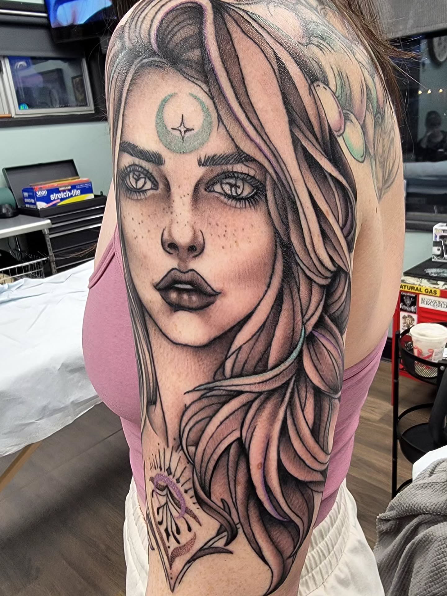Woman's face realism tattoo on the shoulder by Chantel Chan, Portland, Oregon