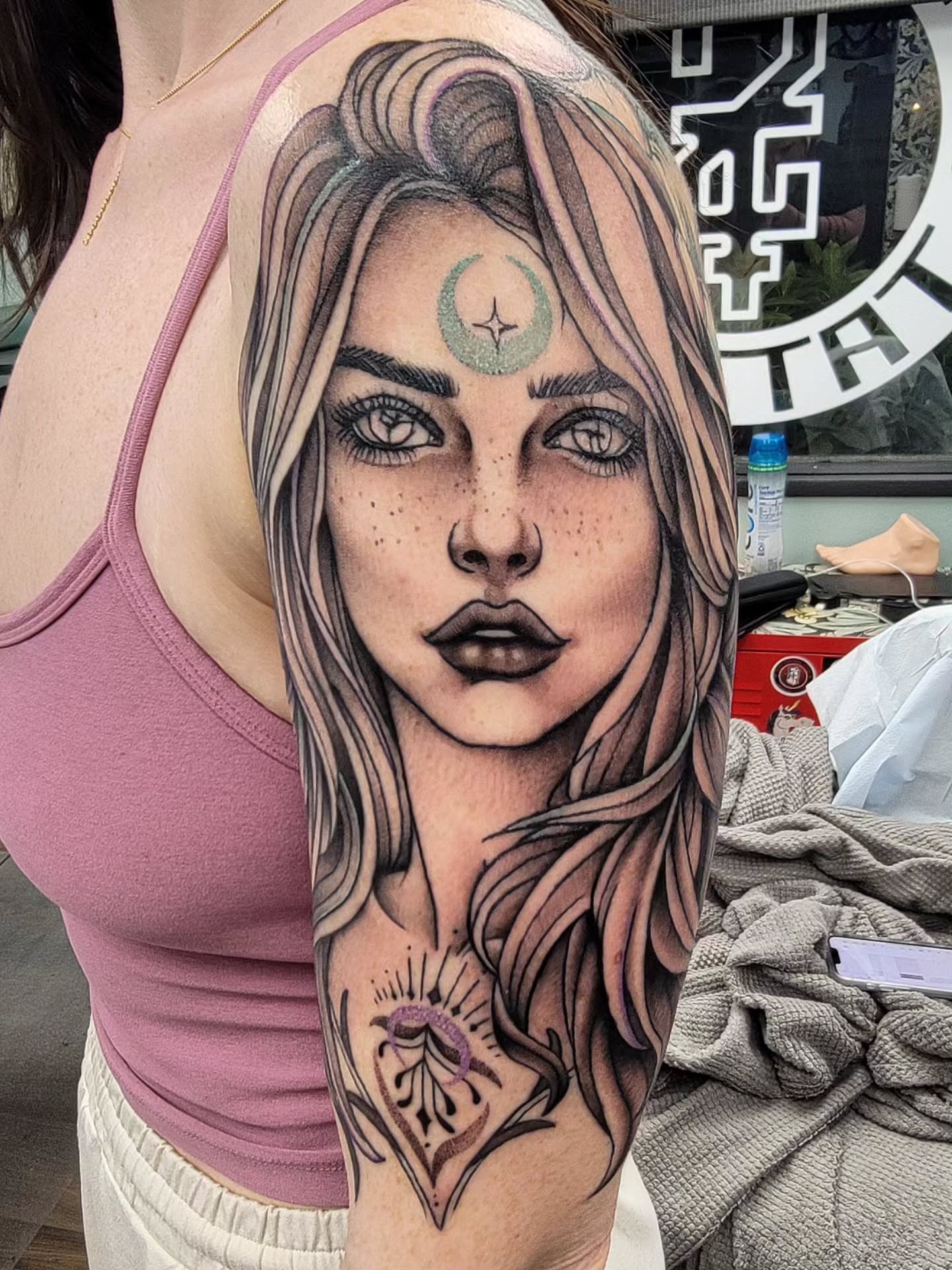 Woman's face realism tattoo on the forearm by Chantel Chan, Portland, Oregon