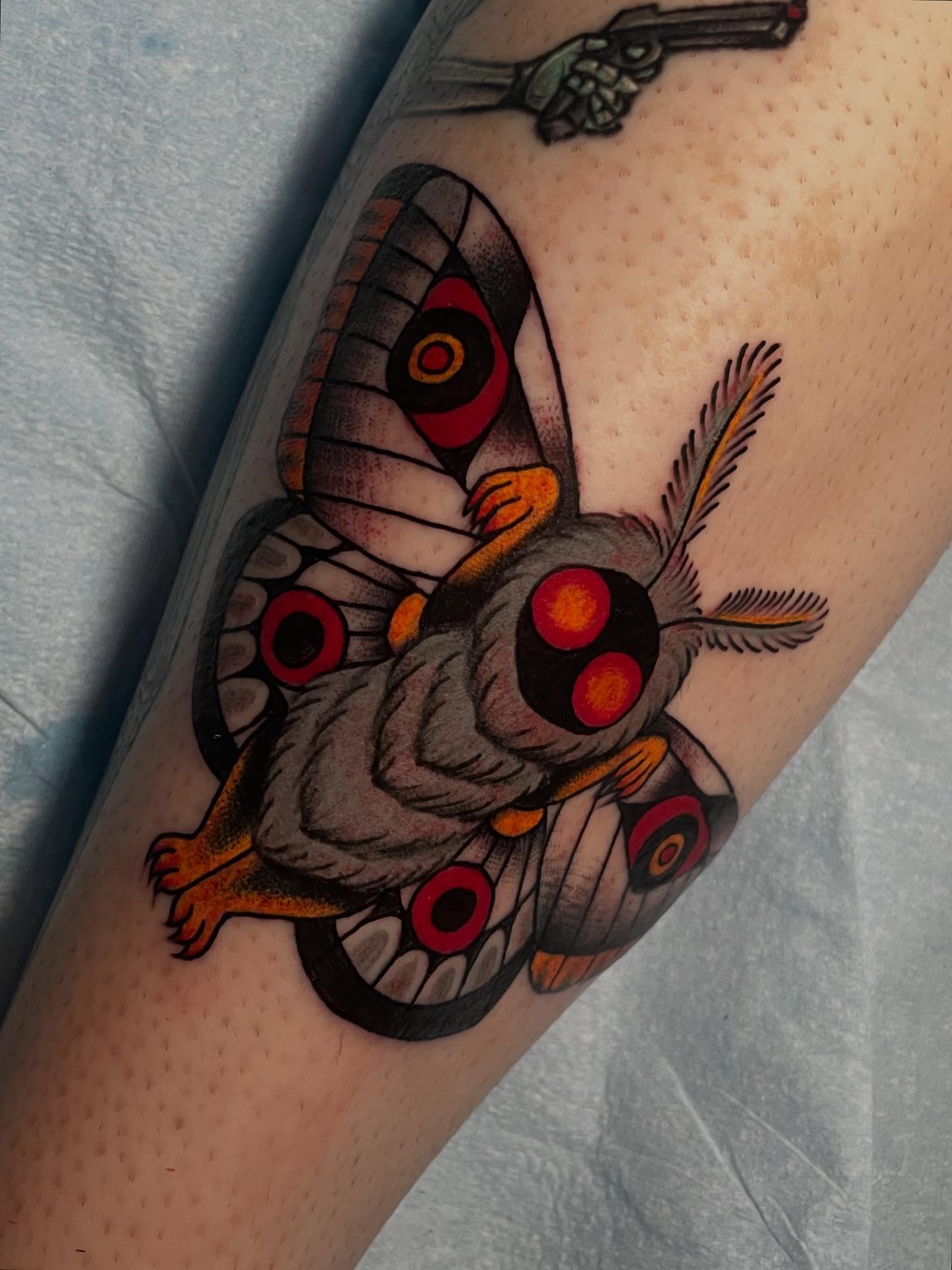 Butterfly American traditional tattoo on the forearm by Madison ‘Maddog’ Stewart