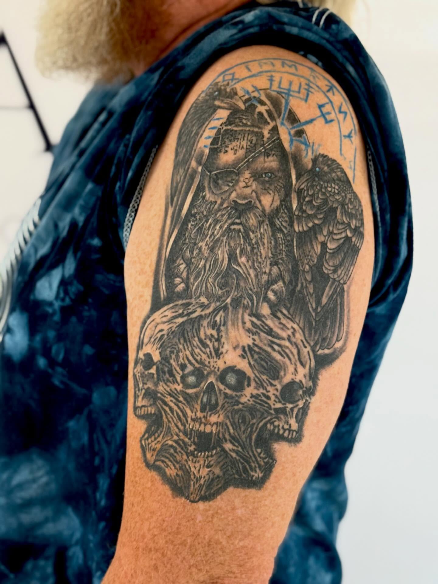 Viking warrior with skulls realism tattoo on the shoulder by Paul Calhoun Tattoos, Englewood, Ohio