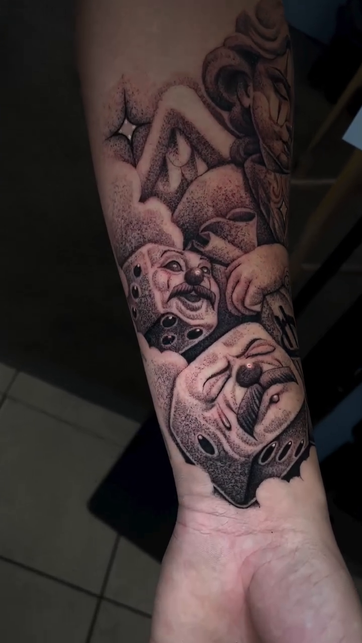Sad clown and dice tattoo realism tattoo on the forearm by Shadoww Espinoza