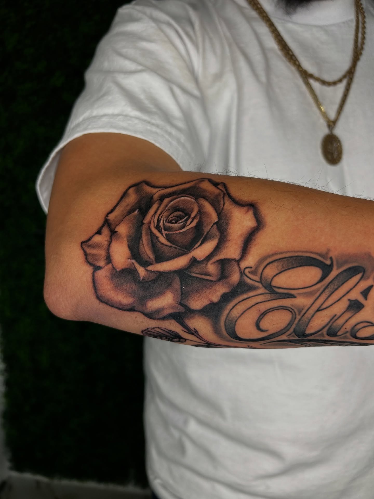Rose black and grey tattoo on the forearm by Melissa C, Phoenix, Arizona