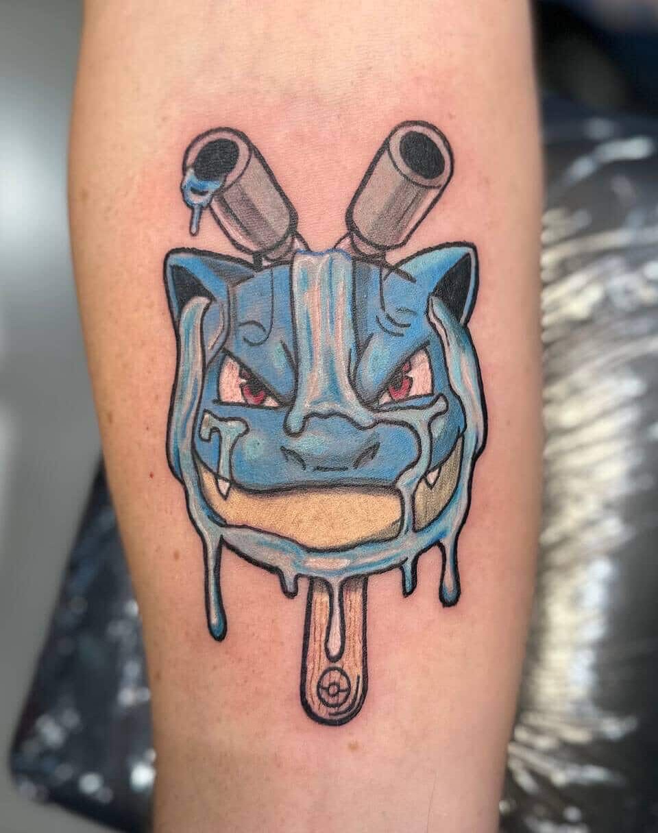 Melted ice cream new school tattoo on the forearm by Zen Forbes