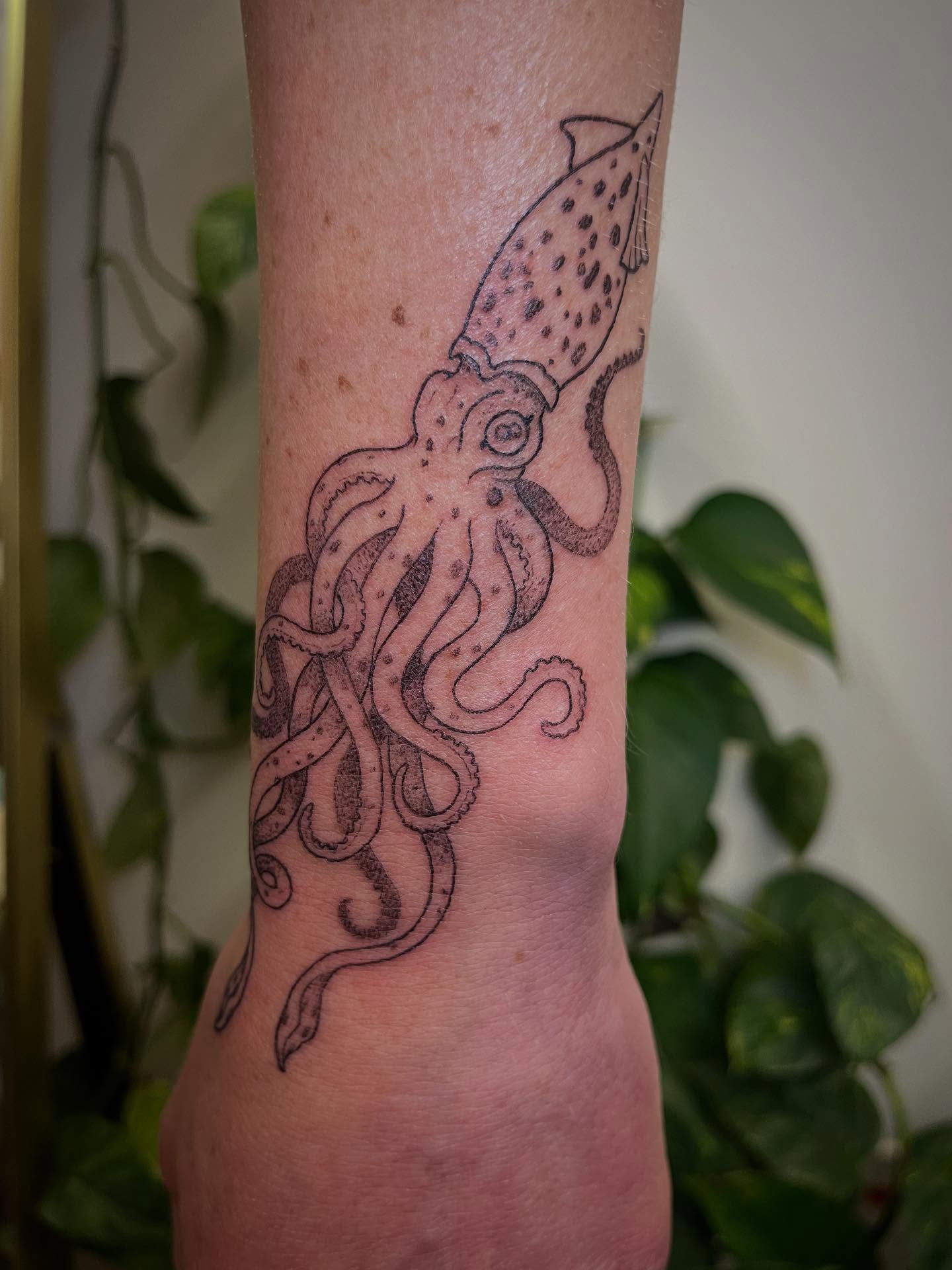 Squid dotwork tattoo on the forearm by Peach ๐, Portland, Oregon