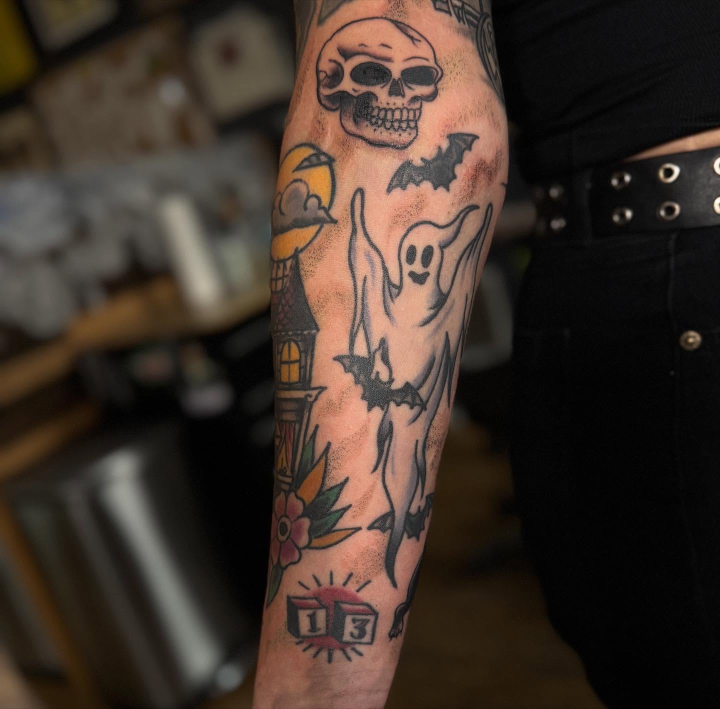 Ghost and bats American traditional tattoo on the forearm by Eric James, Columbus, Ohio