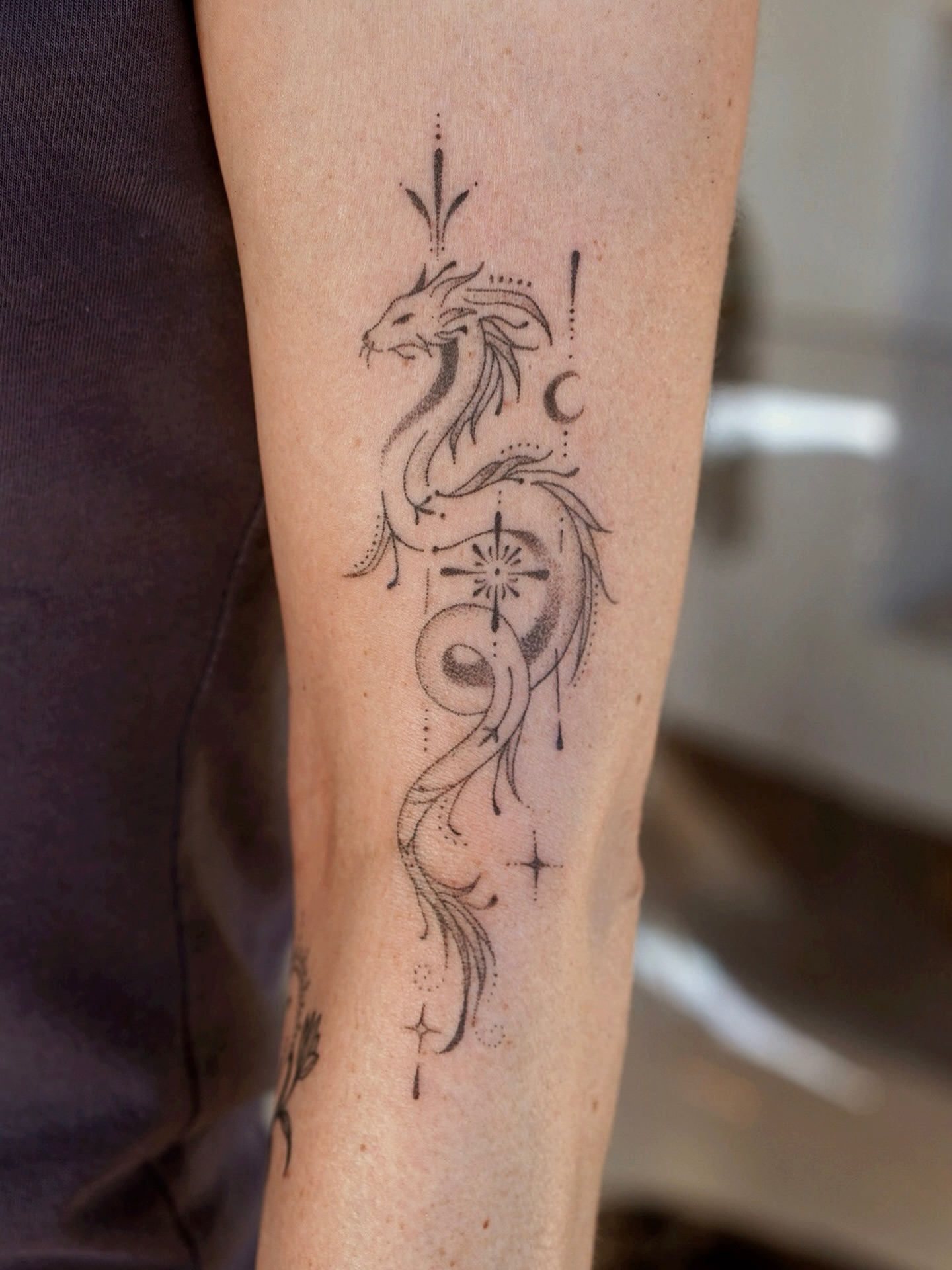 Tattoo by @poeticpokes — dotwork, geometric
