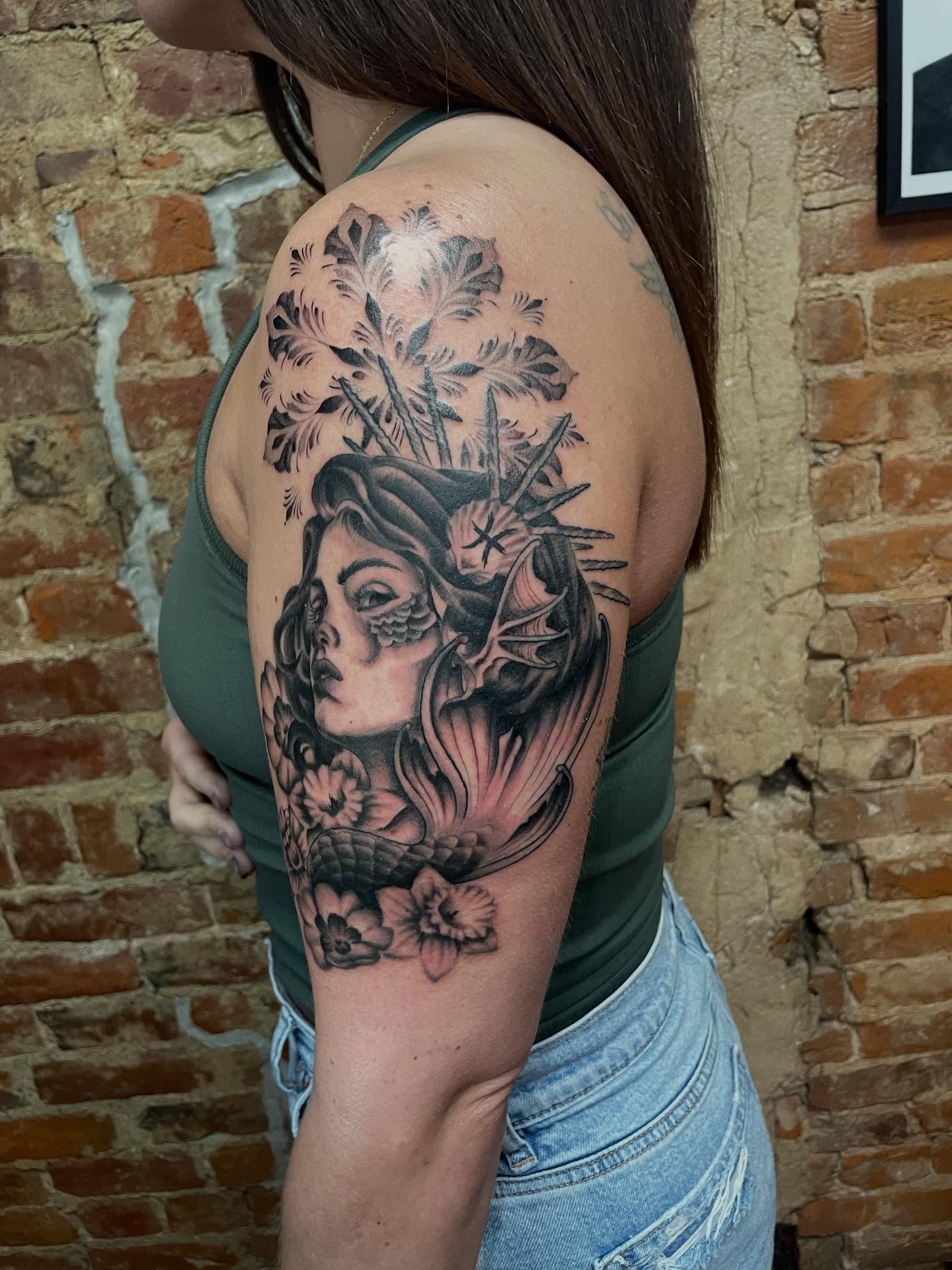 Woman with flowers realism tattoo on the shoulder by Auzzy the Ink Pirate, Mansfield, Ohio