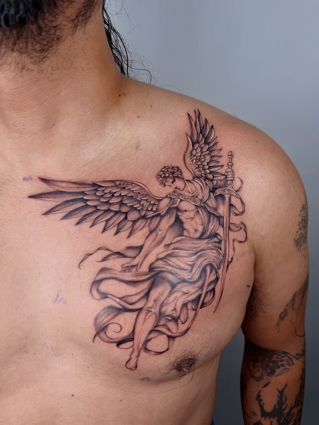 Angel with sword realism tattoo on the chest by bella :)