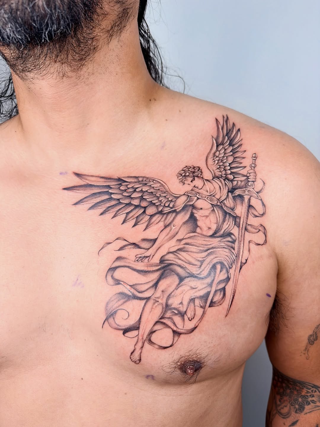 Angel with sword realism tattoo on the chest by bella :)