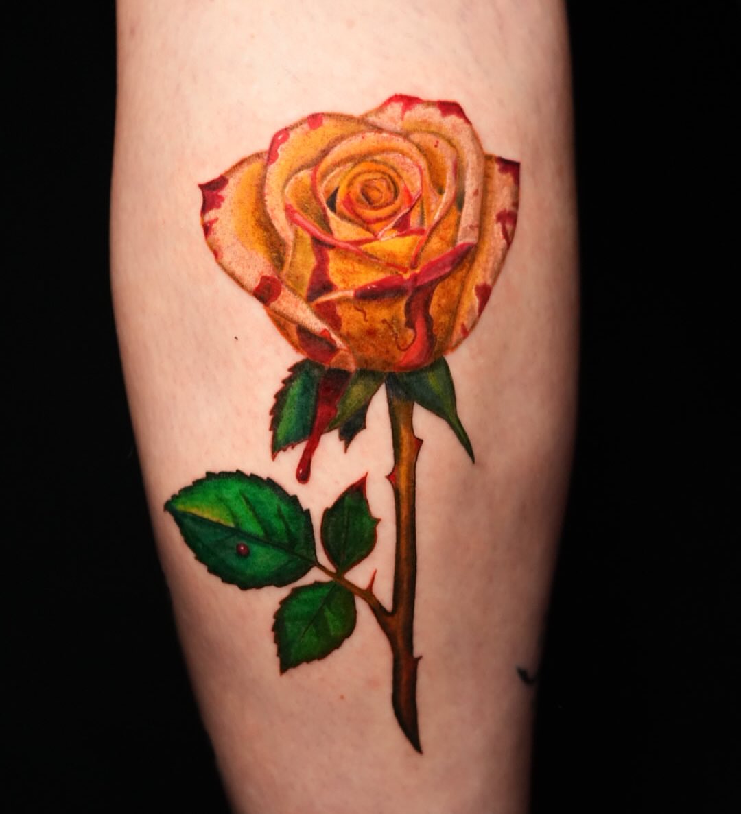 Rose realism tattoo on the forearm by Rayvin Patton