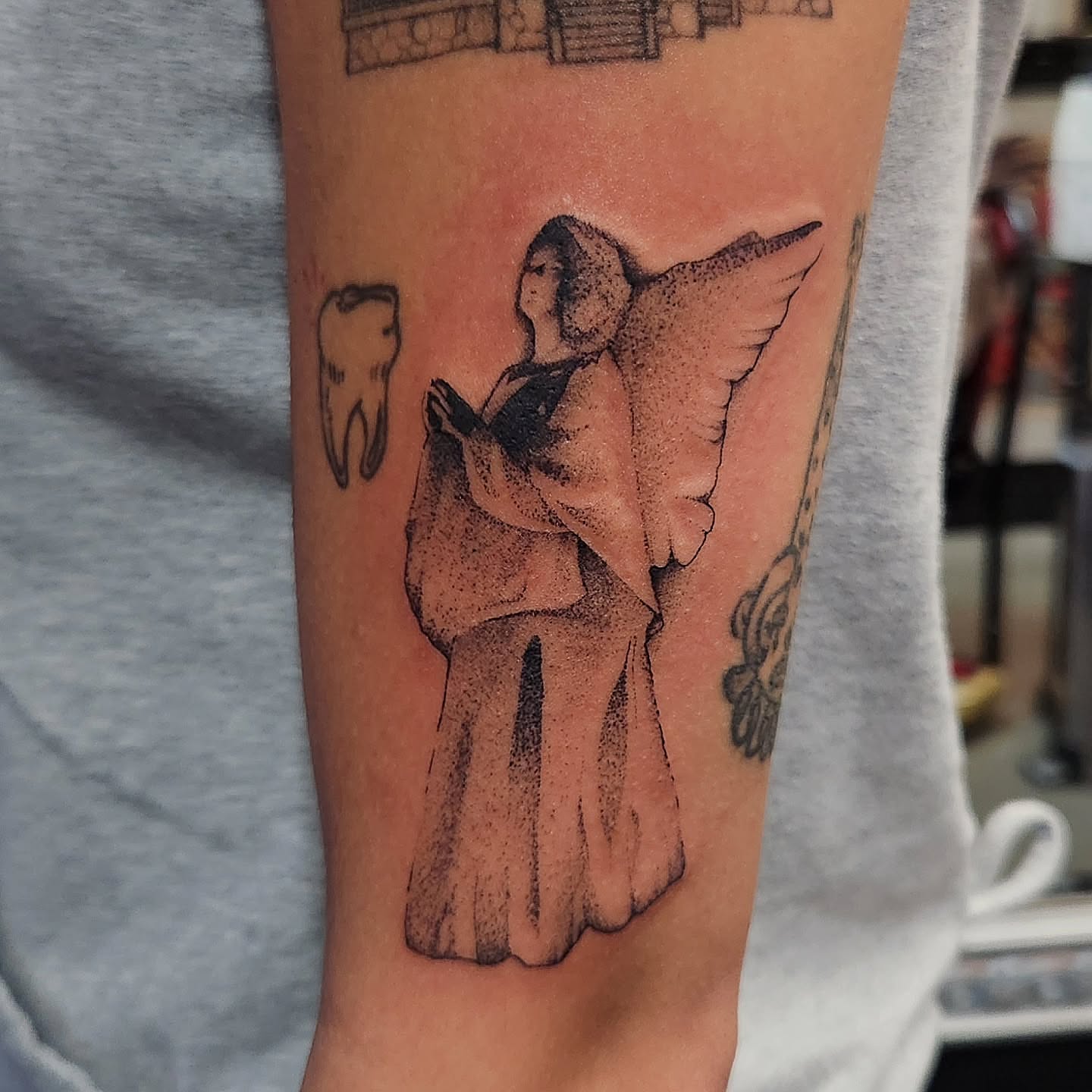 Tattoo by @stone_man720 — dotwork