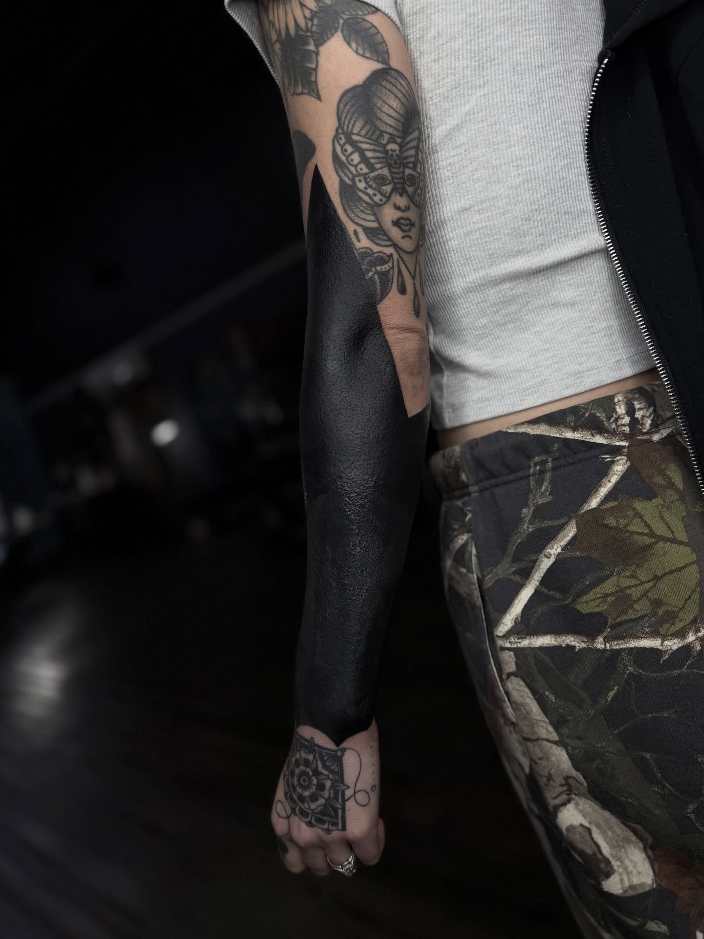 Woman's face American traditional tattoo on the forearm by Emersyn DeLuna