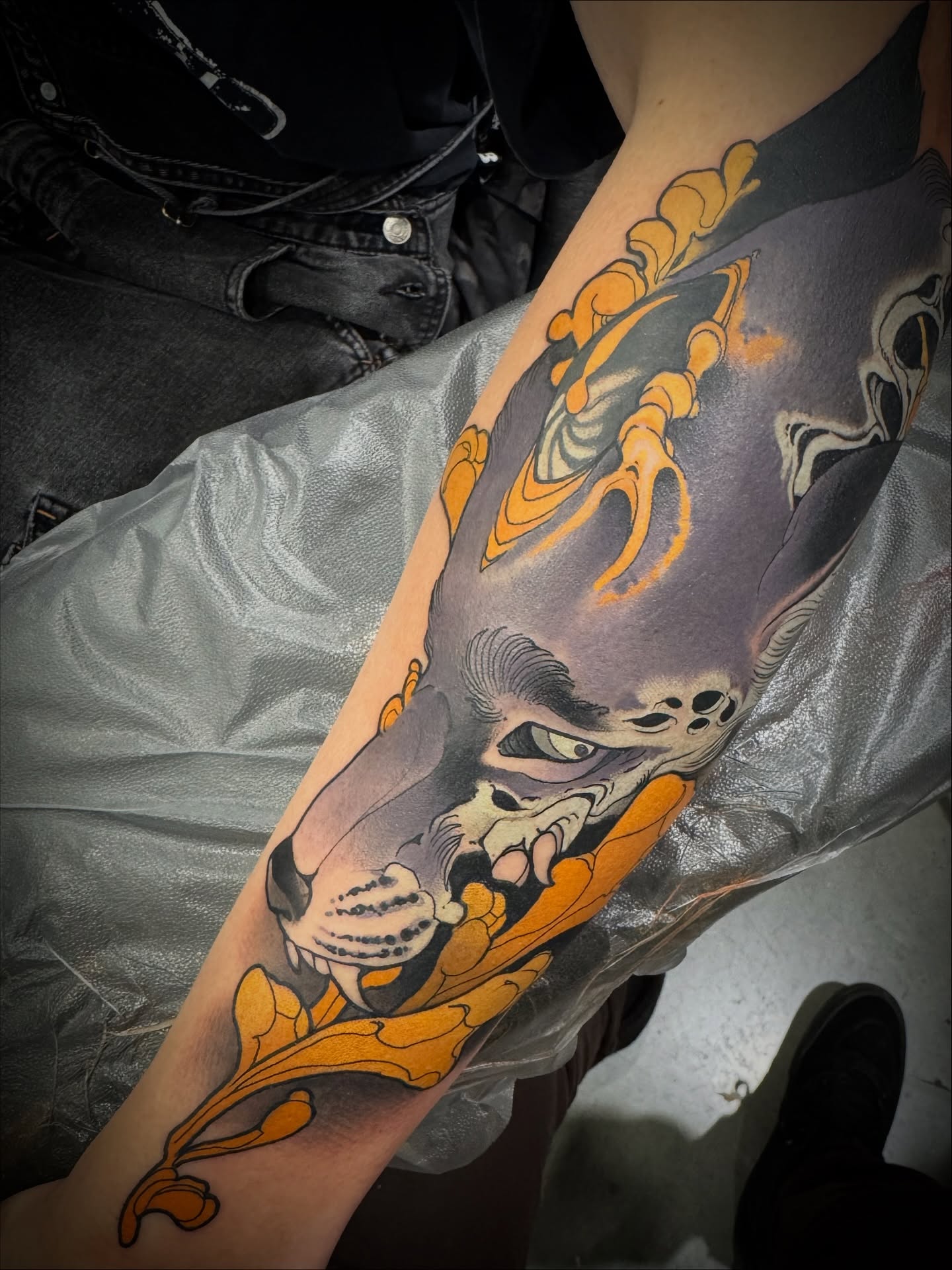 Skull with flames American traditional tattoo on the forearm by Emmanuel Mendoza