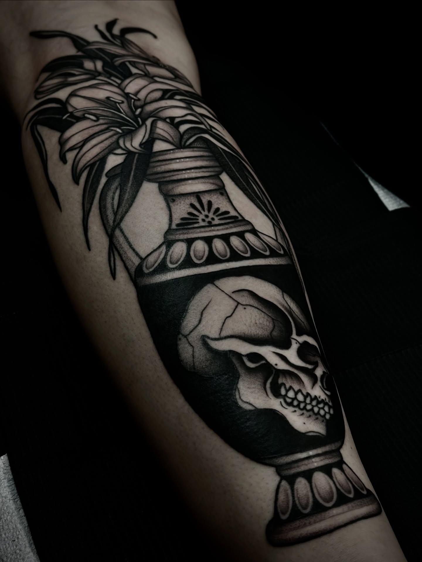 Skull and vase realism tattoo on the forearm by Ally noel