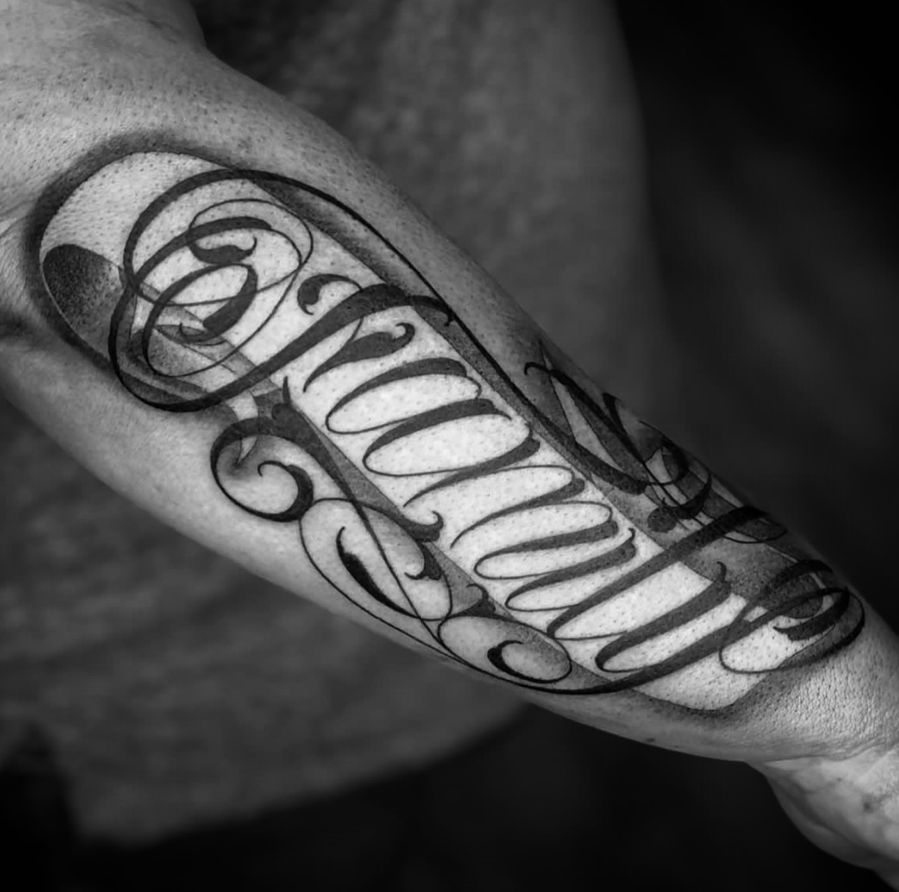 Script lettering lettering script tattoo on the forearm by Big Steve Lewis