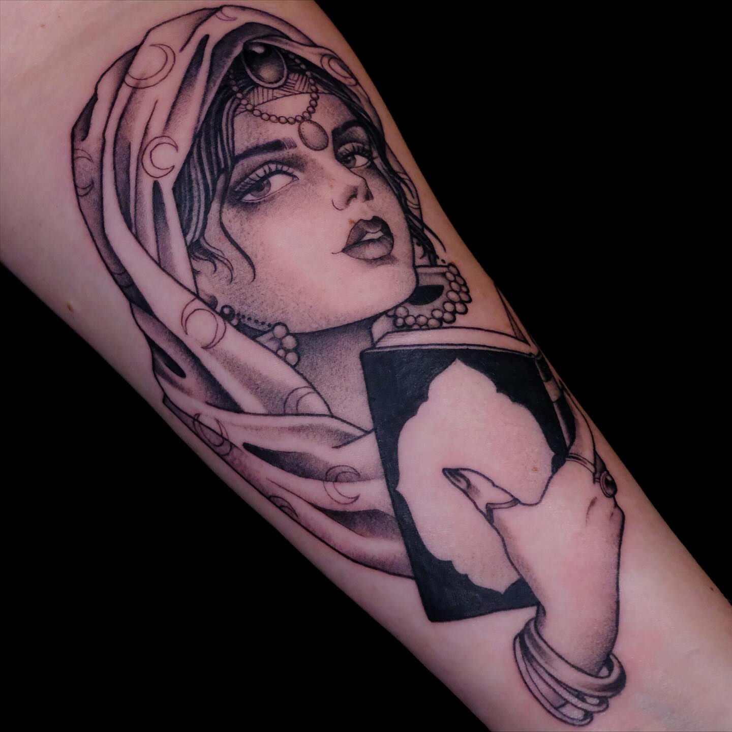 Woman with scarf realism tattoo on the forearm by English Cousins, Nashville, Tennessee