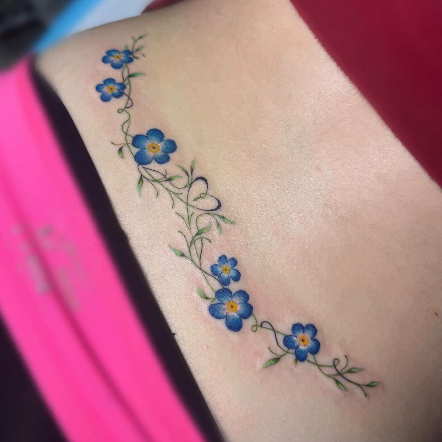 Blue flowers dotwork tattoo by Elly Bordwell