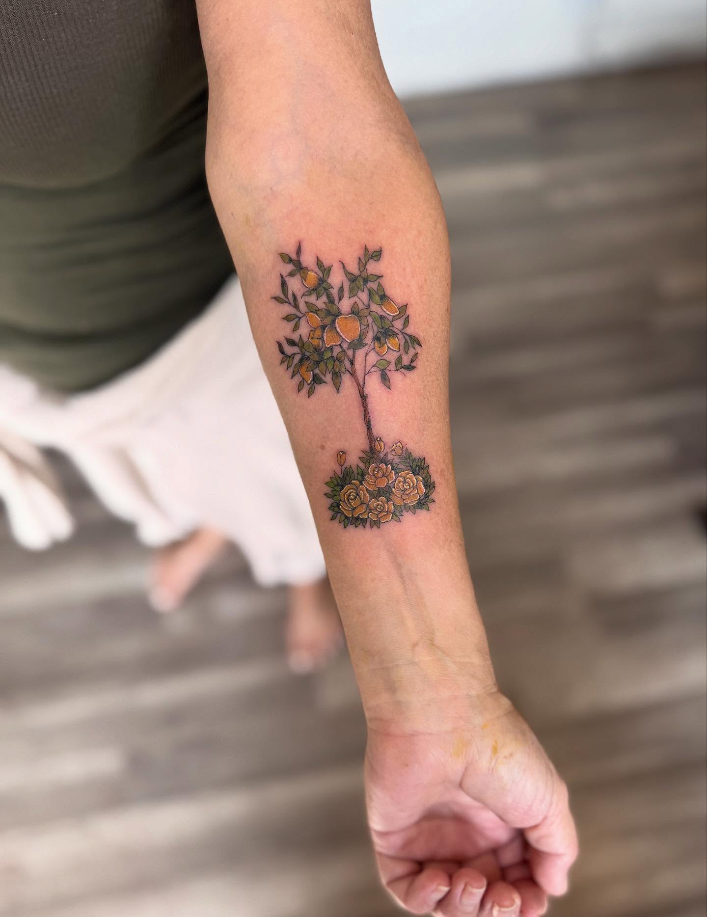 Orange tree dotwork tattoo on the forearm by Jessica Abbey