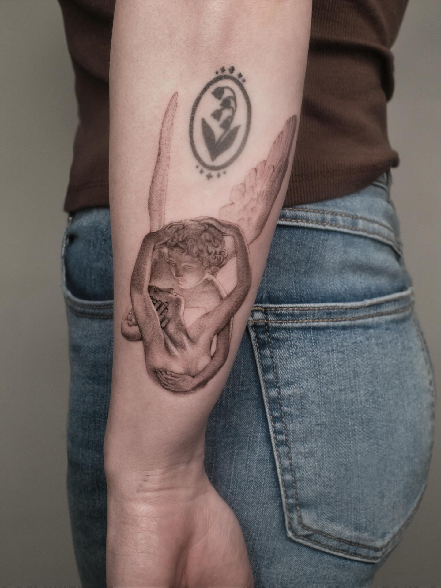 Cherub realism tattoo on the forearm by Tattoo artist LA ། Fine line, Micro realism