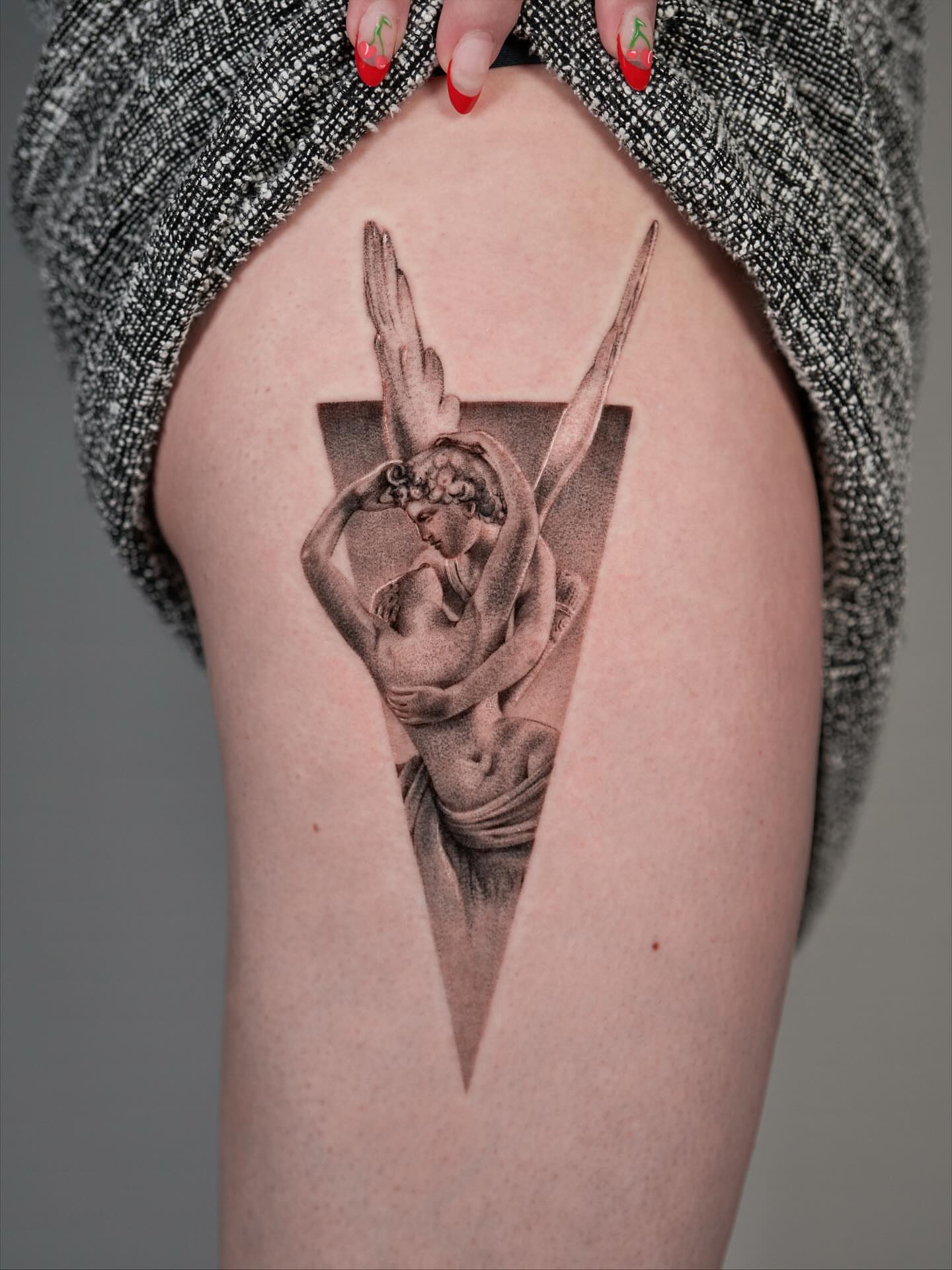 Statue of an angel realism tattoo on the thigh by Tattoo artist LA ། Fine line, Micro realism